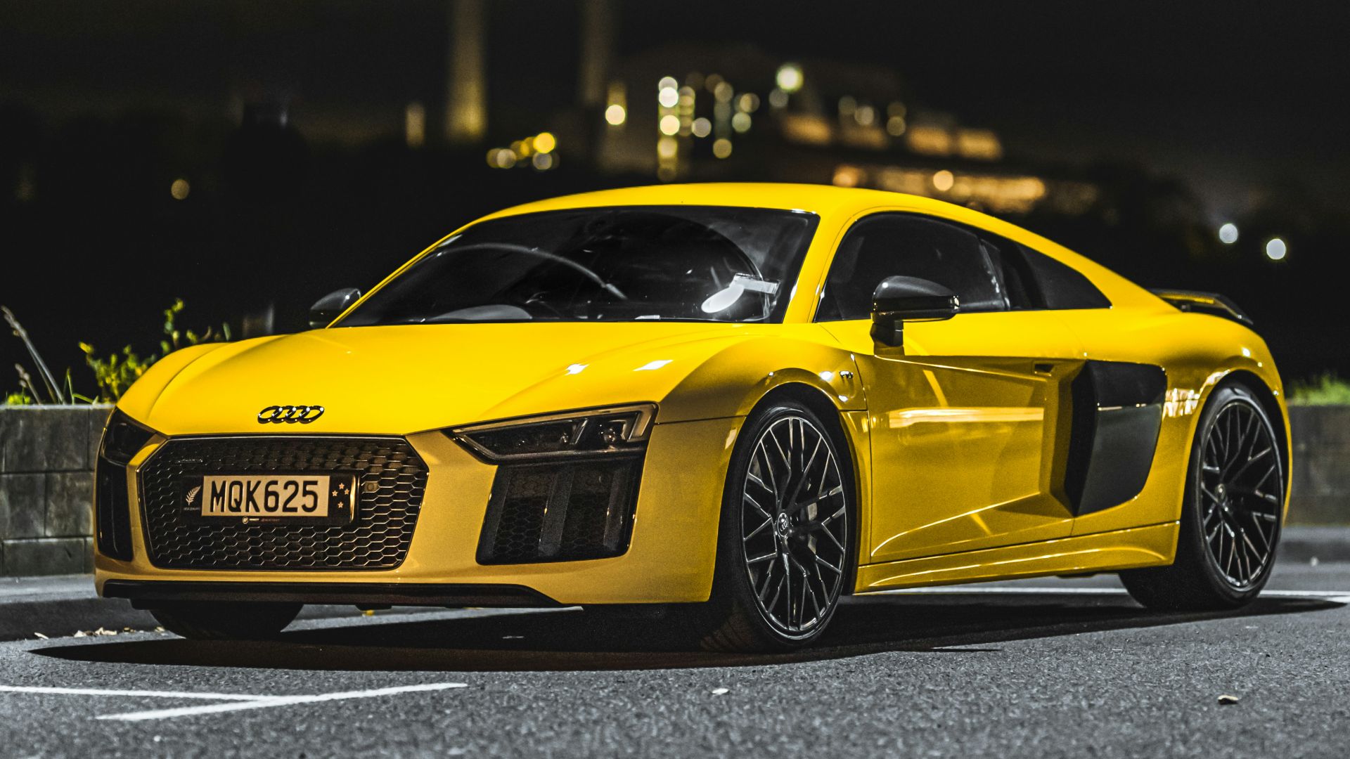 yellow lamborghini aventador on road during night time