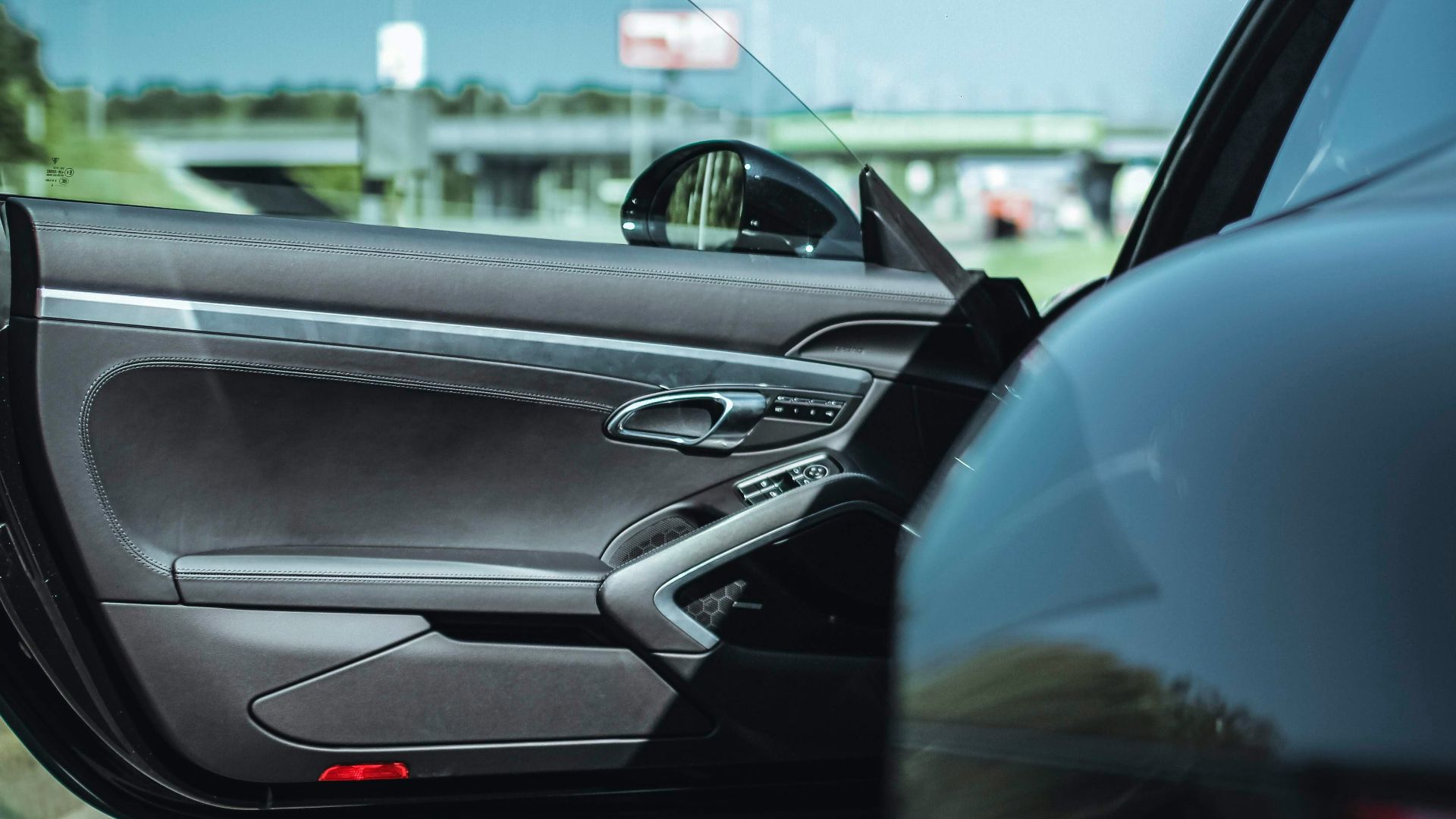 opened black vehicle's door