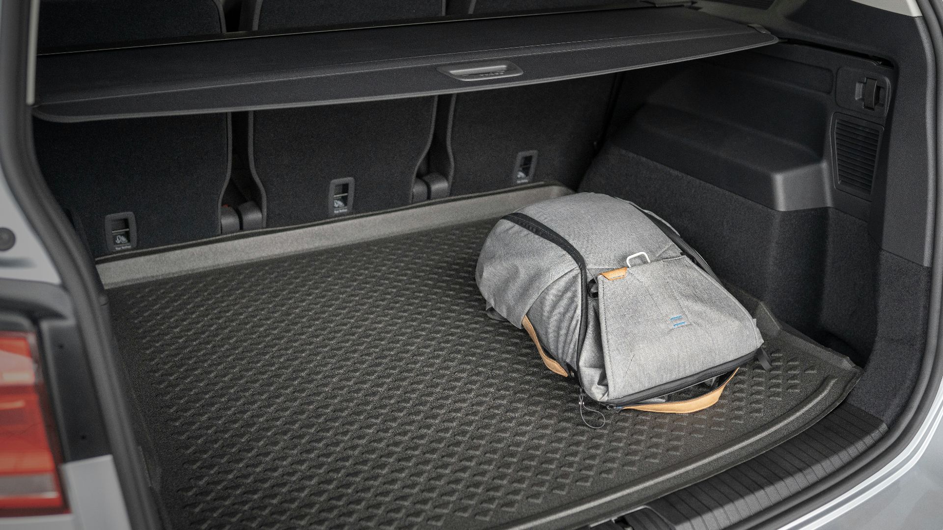 gray and yellow bag on car seat