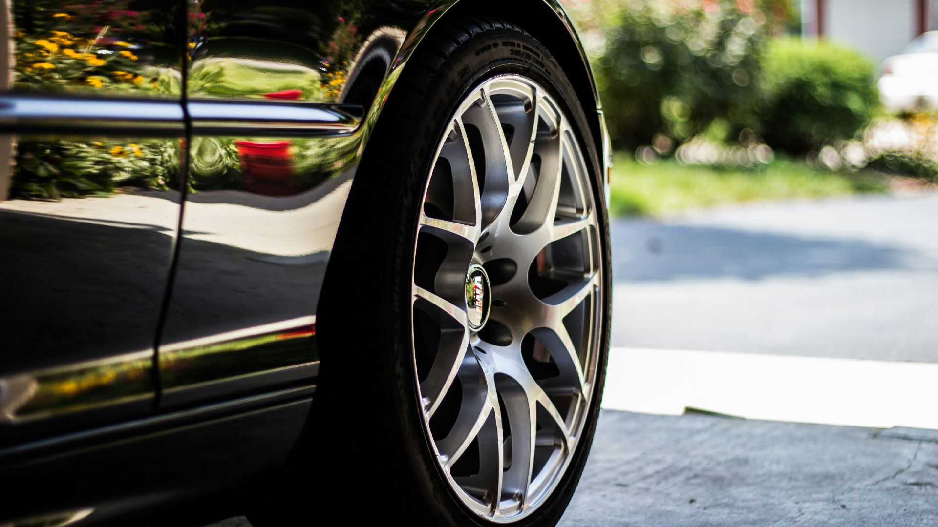 gray vehicle rim with tire