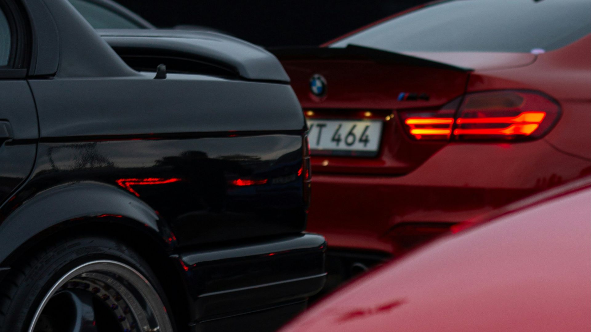 A couple of cars parked next to each other