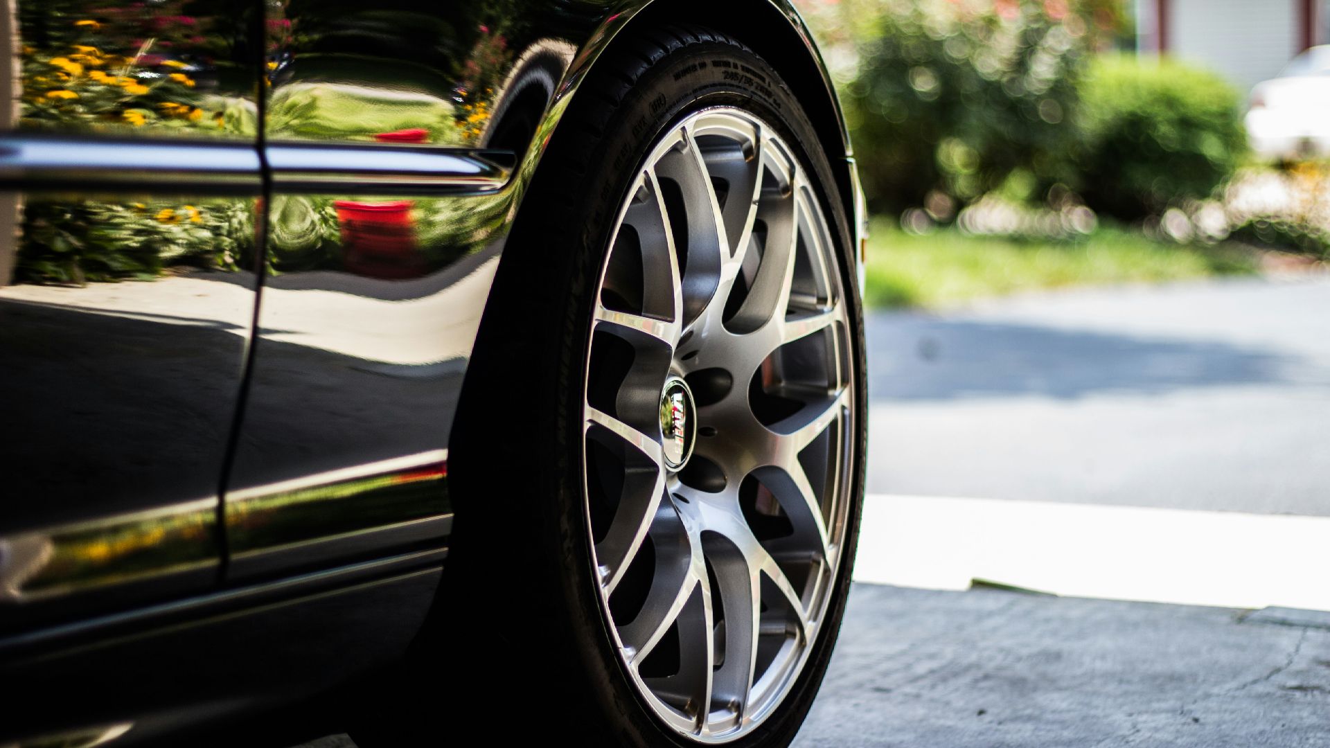 gray vehicle rim with tire