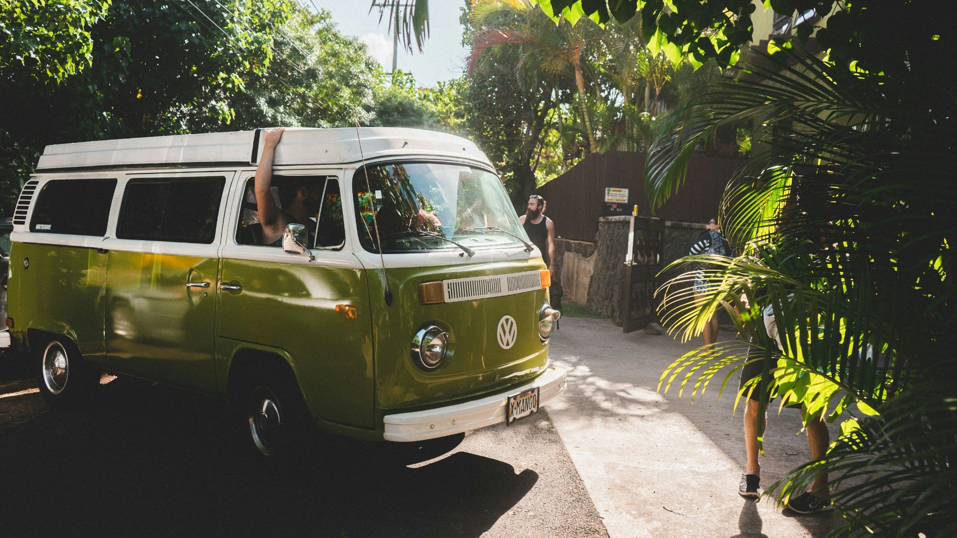 green and white Volkswagen transporter during daytime