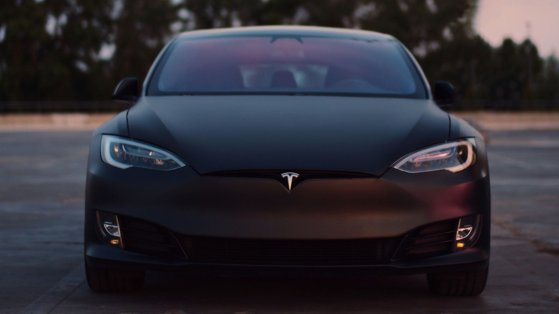 black porsche 911 on road during sunset