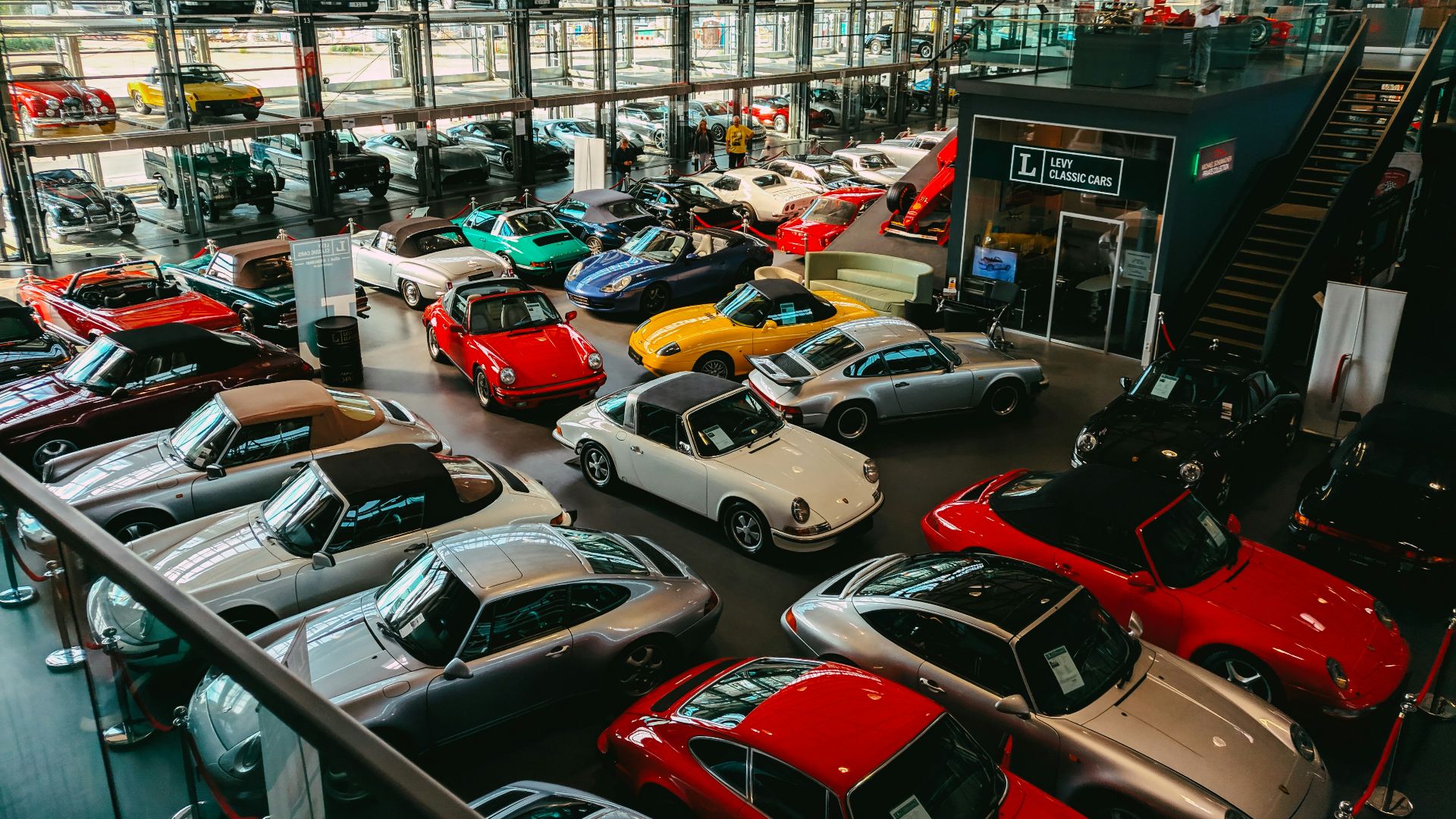 cars parked in front of building during daytime