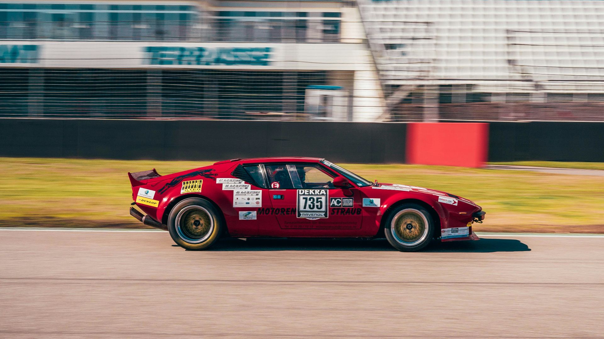 red porsche 911 on track field