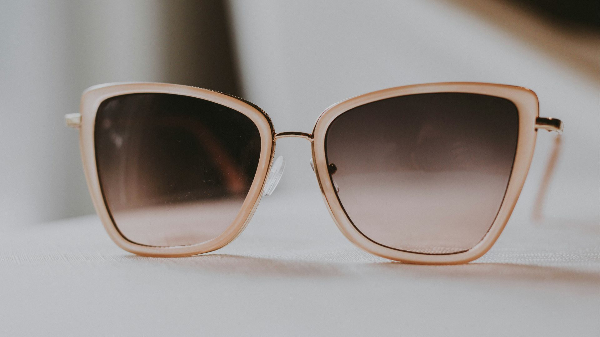 gray sunglasses with white frames