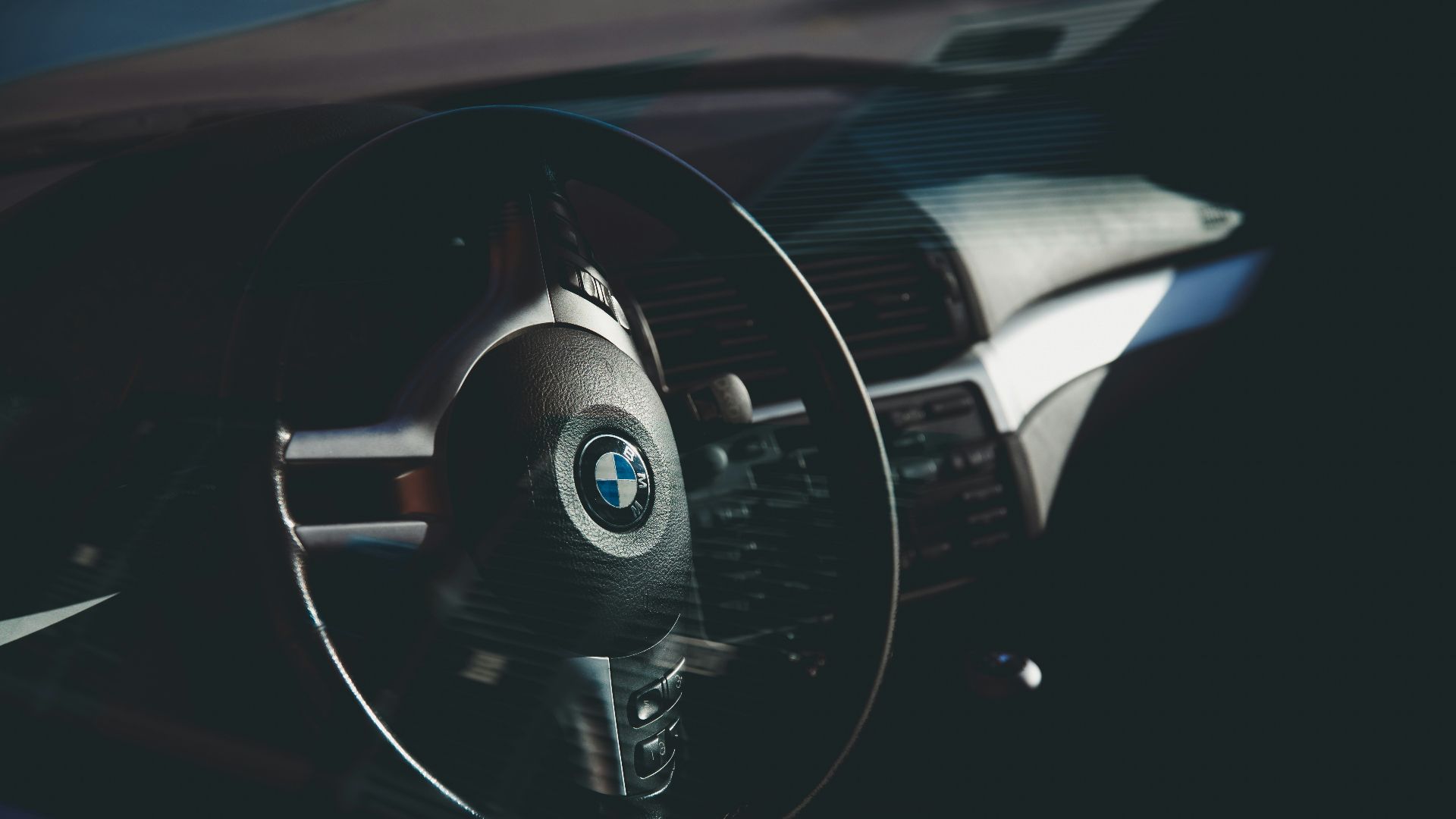 black BMW car steering wheel