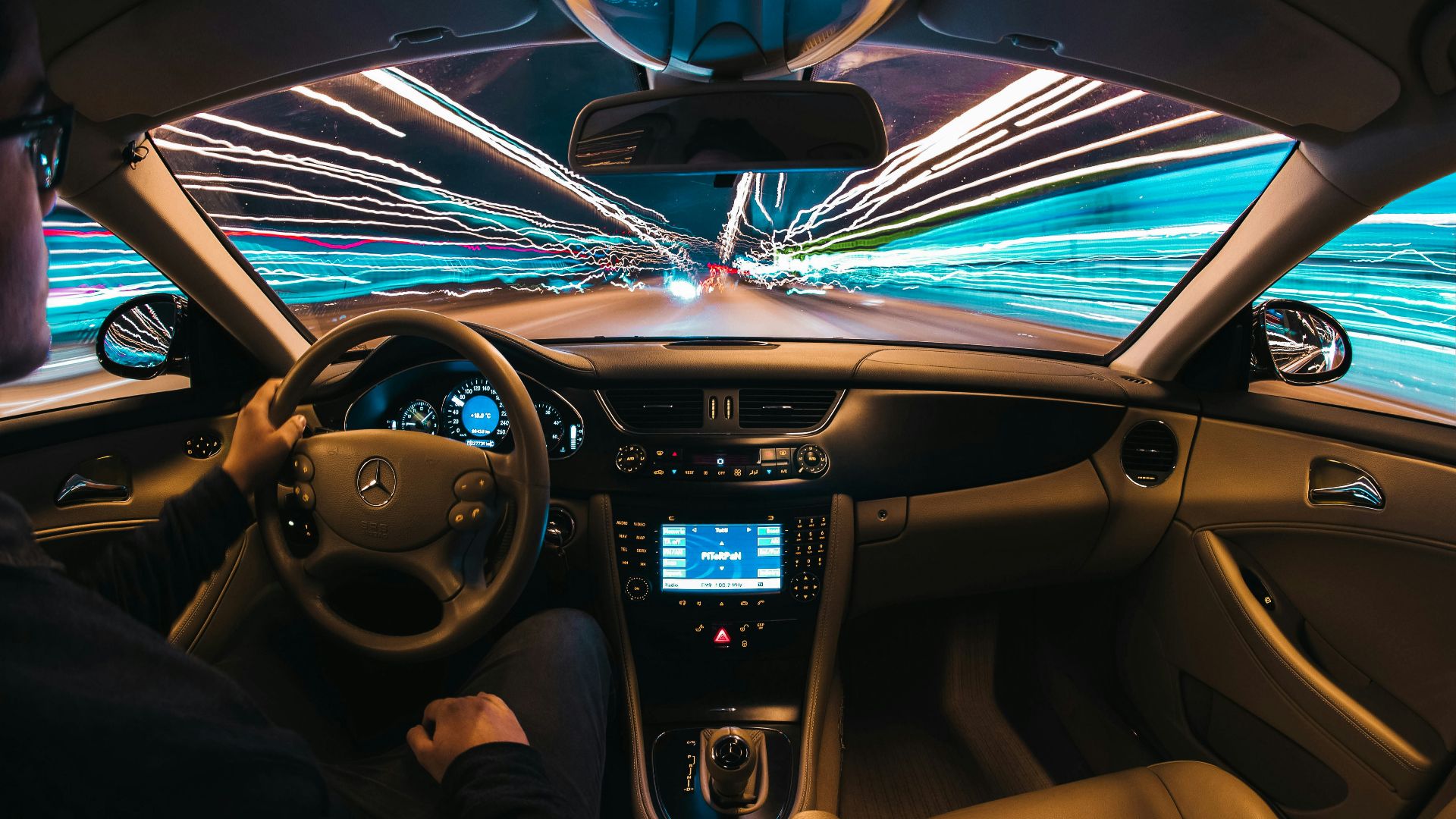 time lapse photography of man riding car