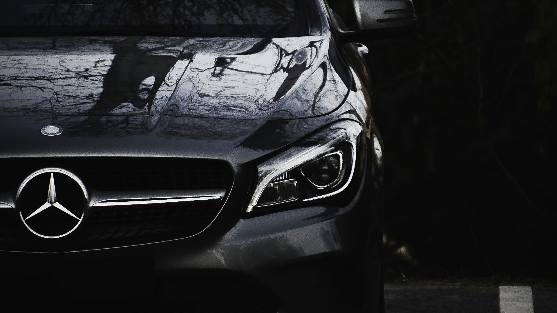 black mercedes benz c class on road during daytime