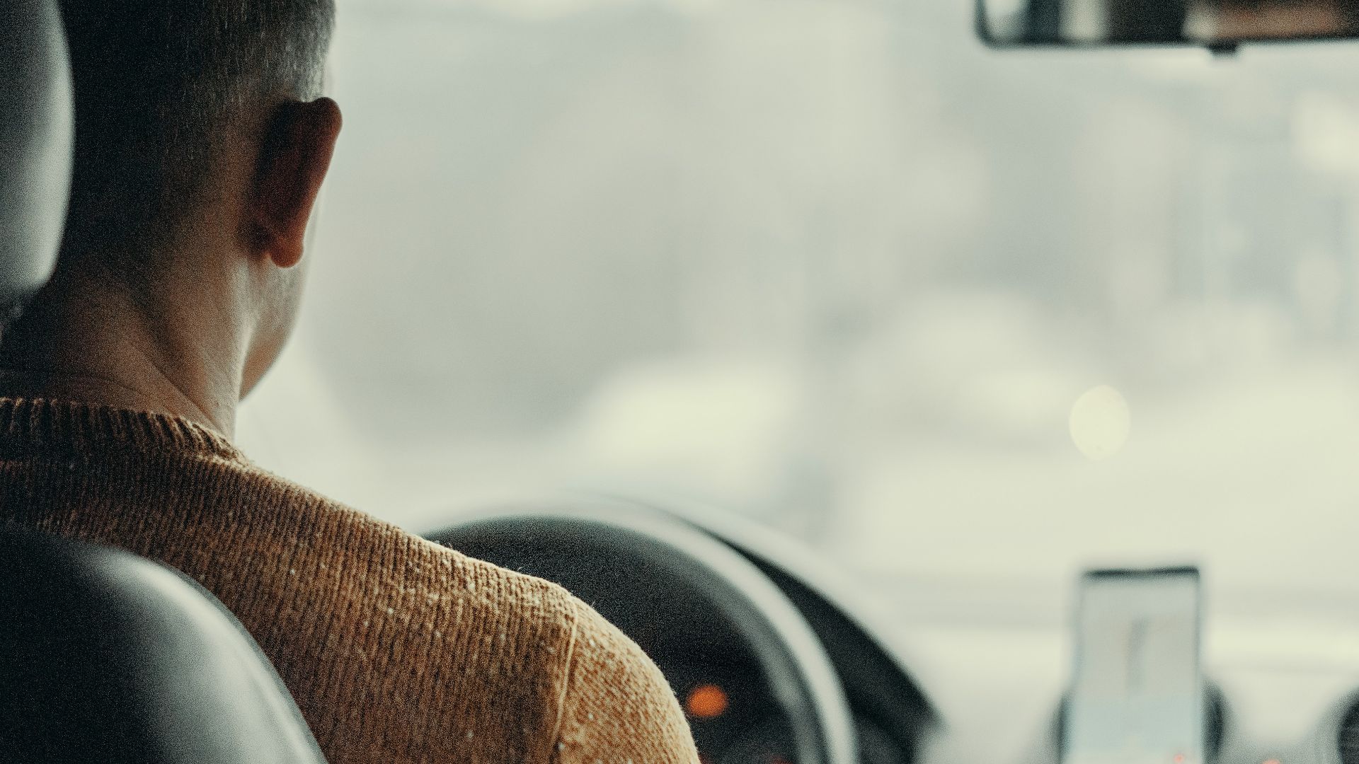 man driving vehicle