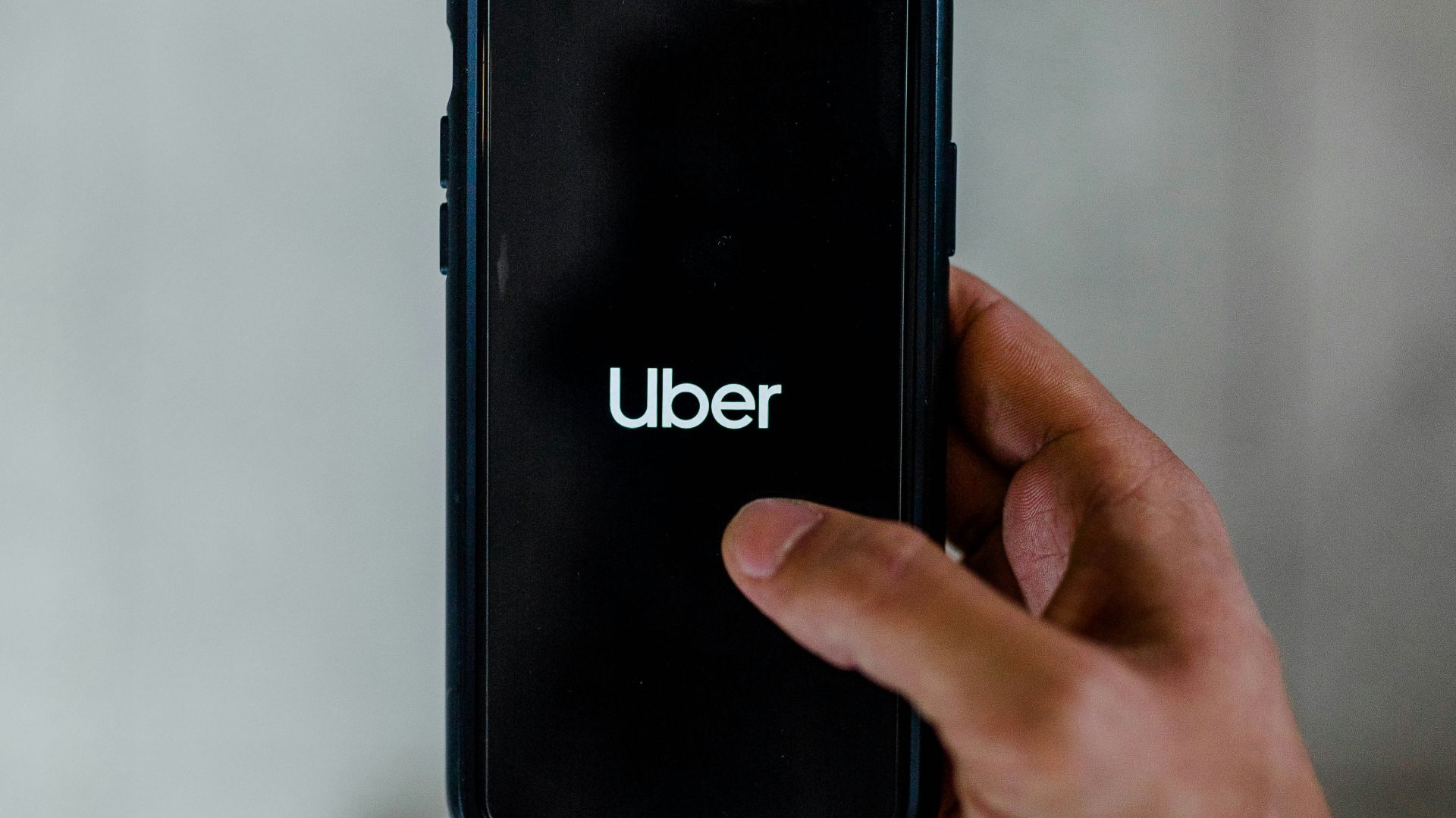 person holding black smartphone