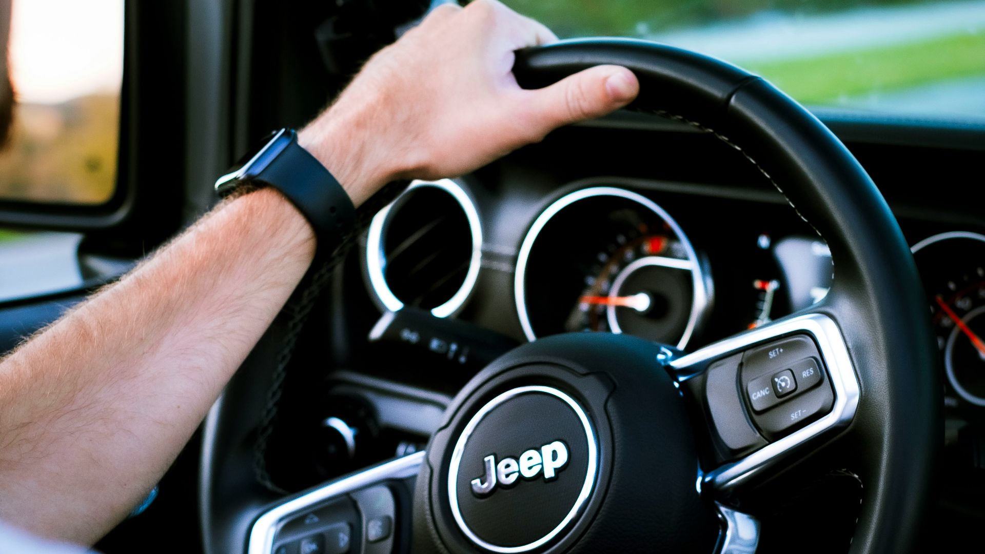 person driving black mercedes benz car