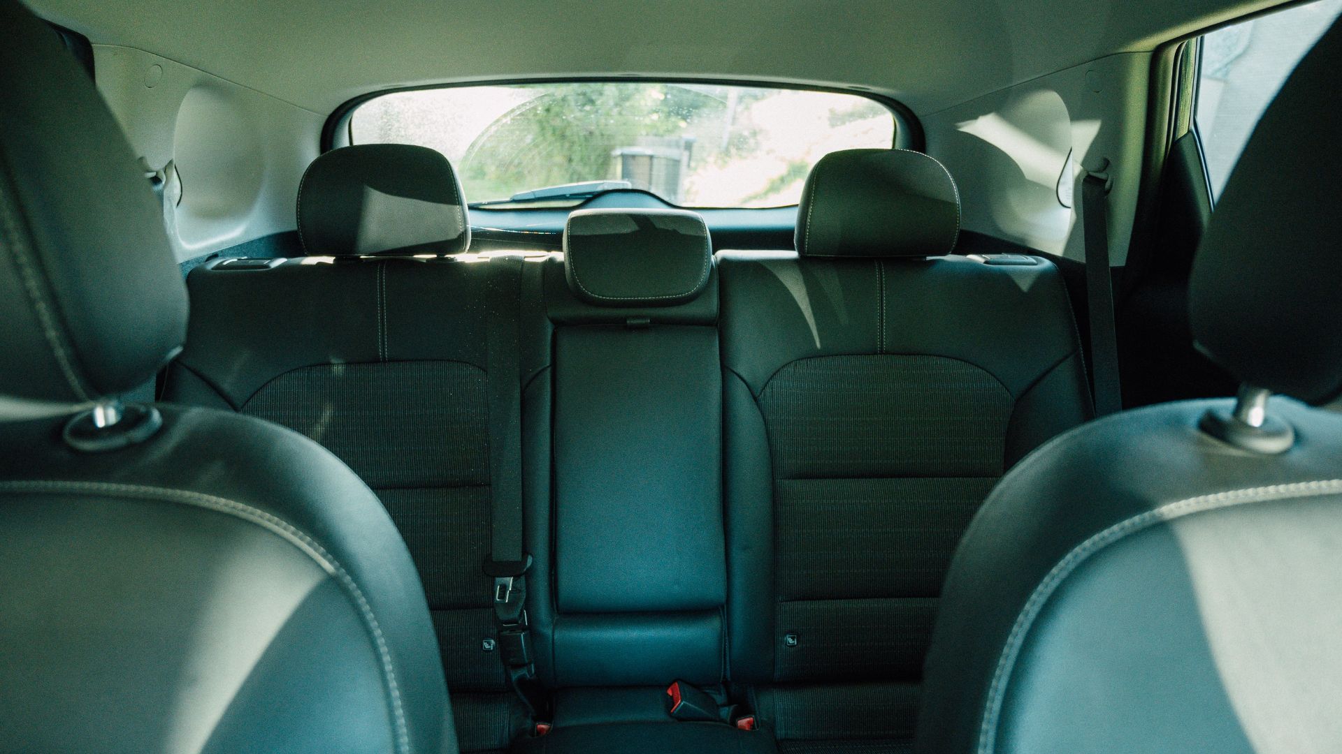 black leather car seat during daytime