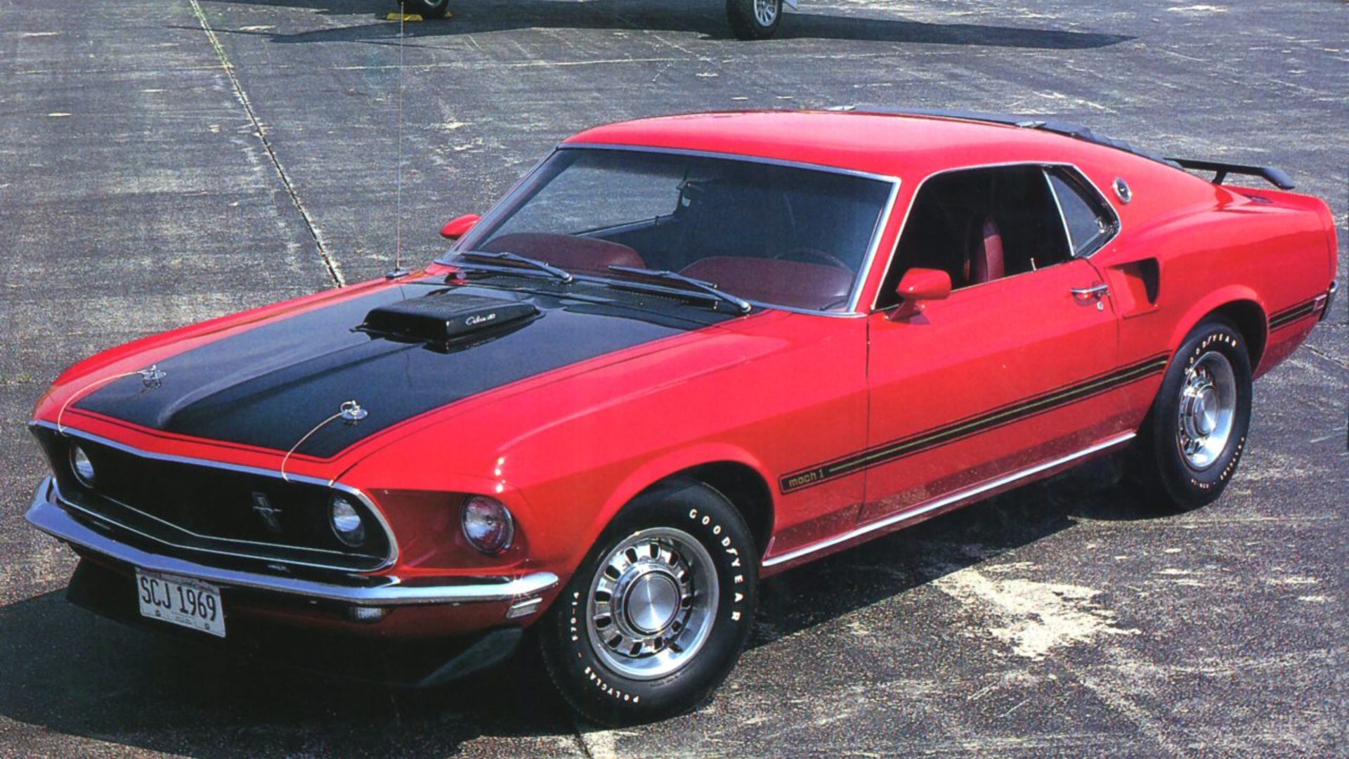 File:1969 Ford Mustang Mach 1 SportsRoof 428 Cobra Je t w P 51 Mustang Fighter Red Frt Qtr.jpg