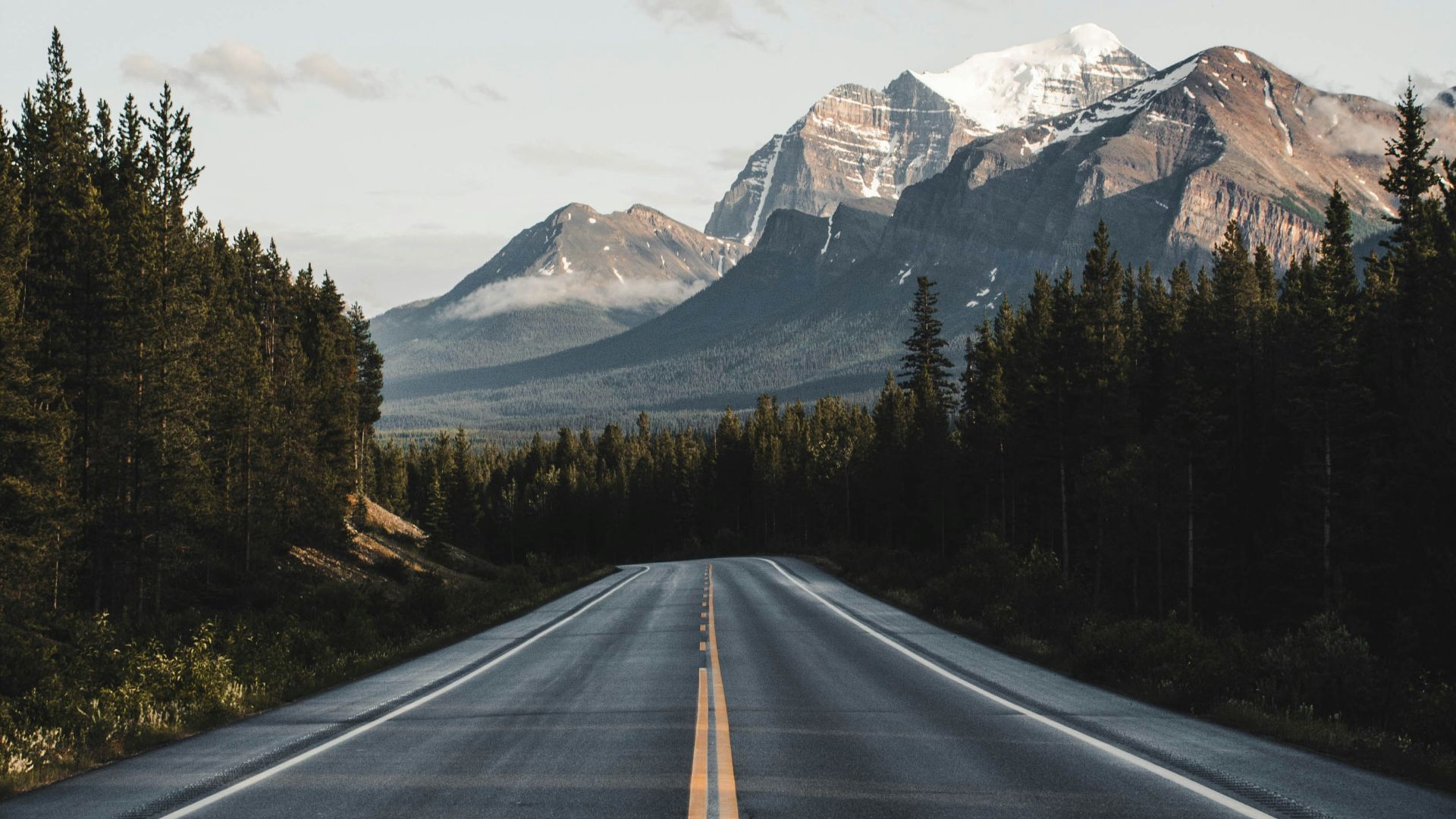 wide road under blue sky