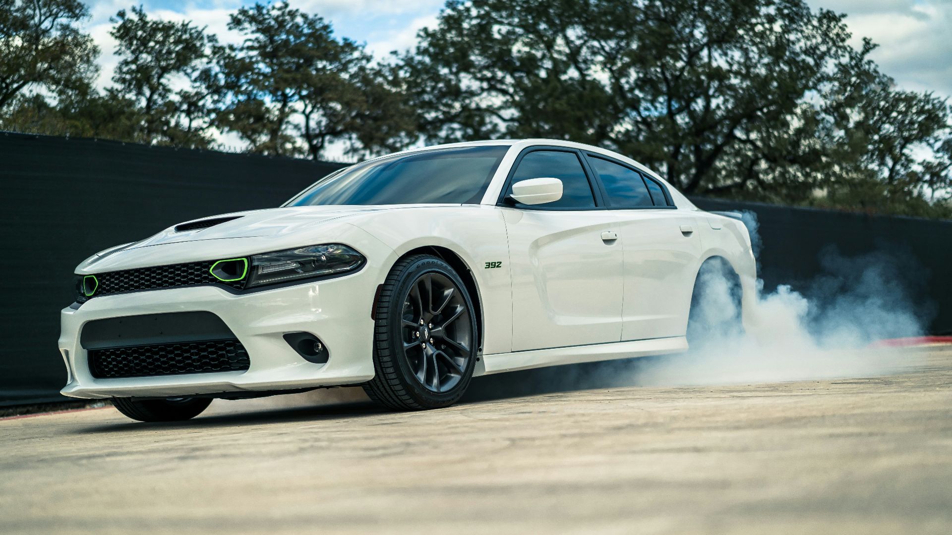 white bmw m 3 coupe on road during daytime