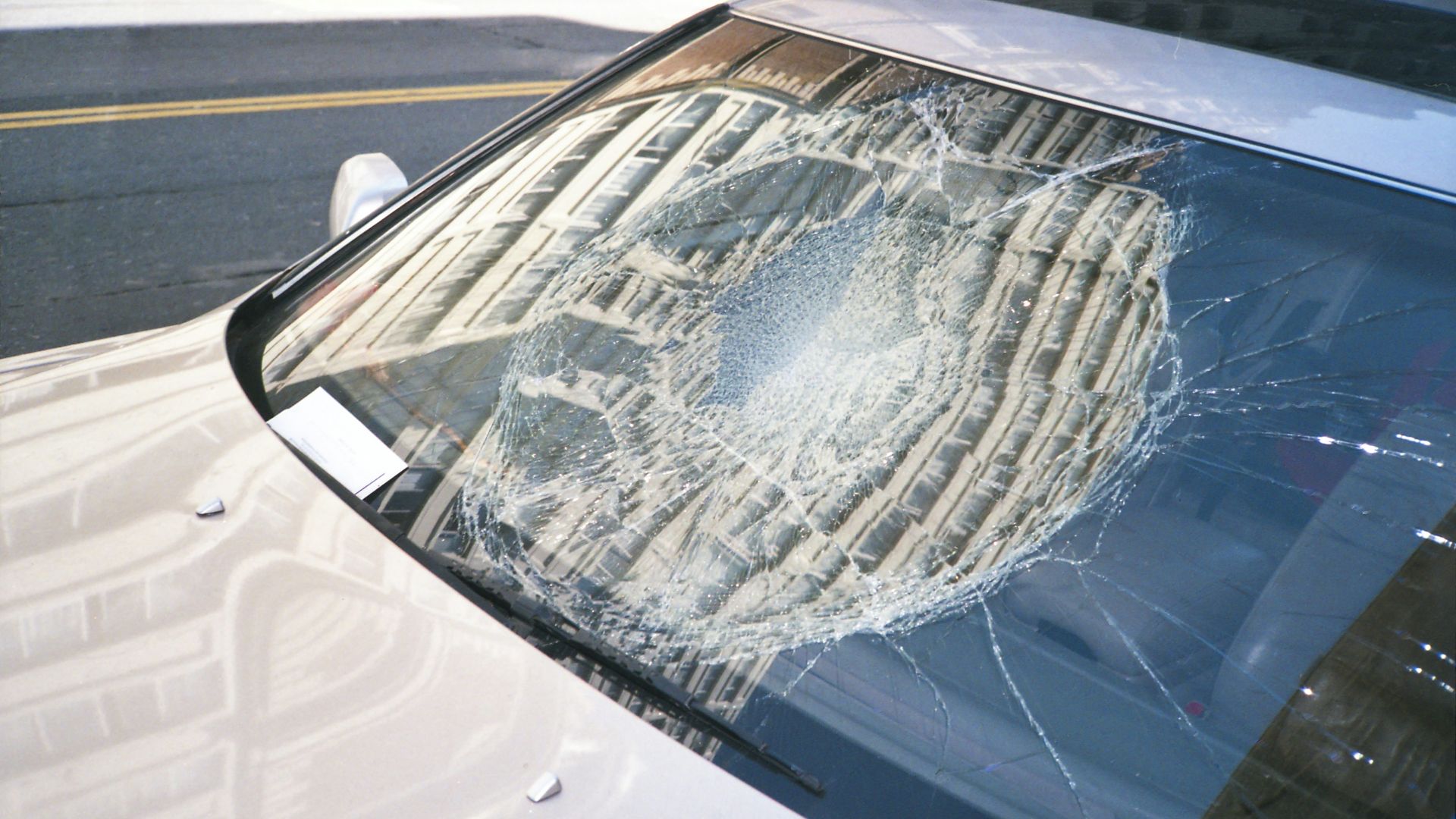 blue car with white snow on top
