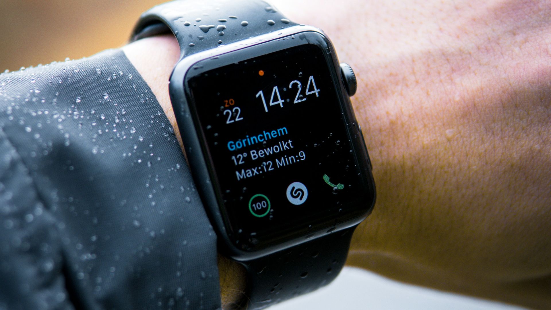 person wearing Apple Watch at 14:24