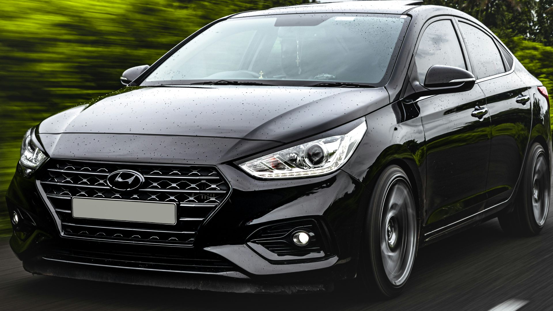 black mercedes benz c class on road during daytime