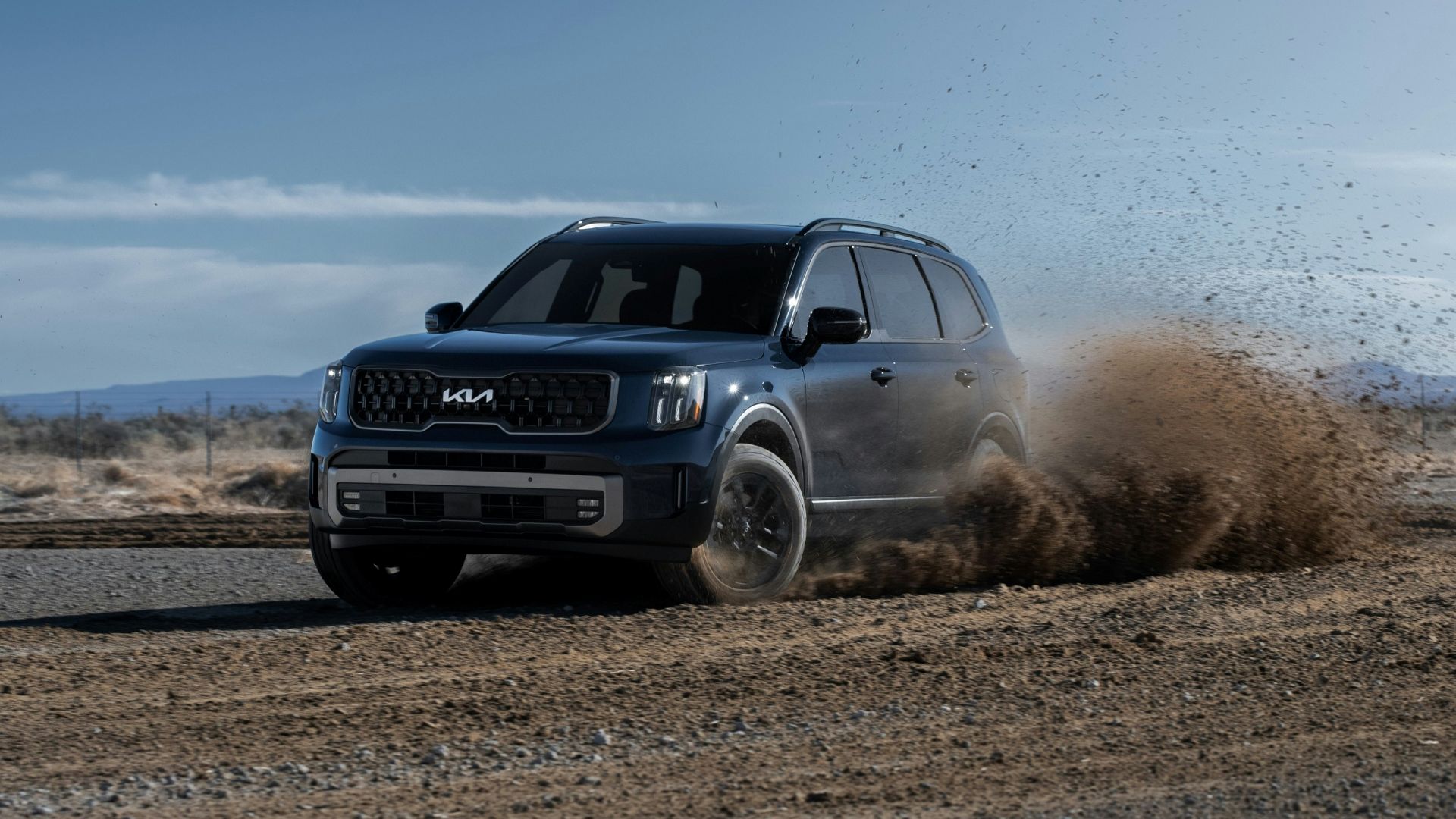 a car driving on a dirt road