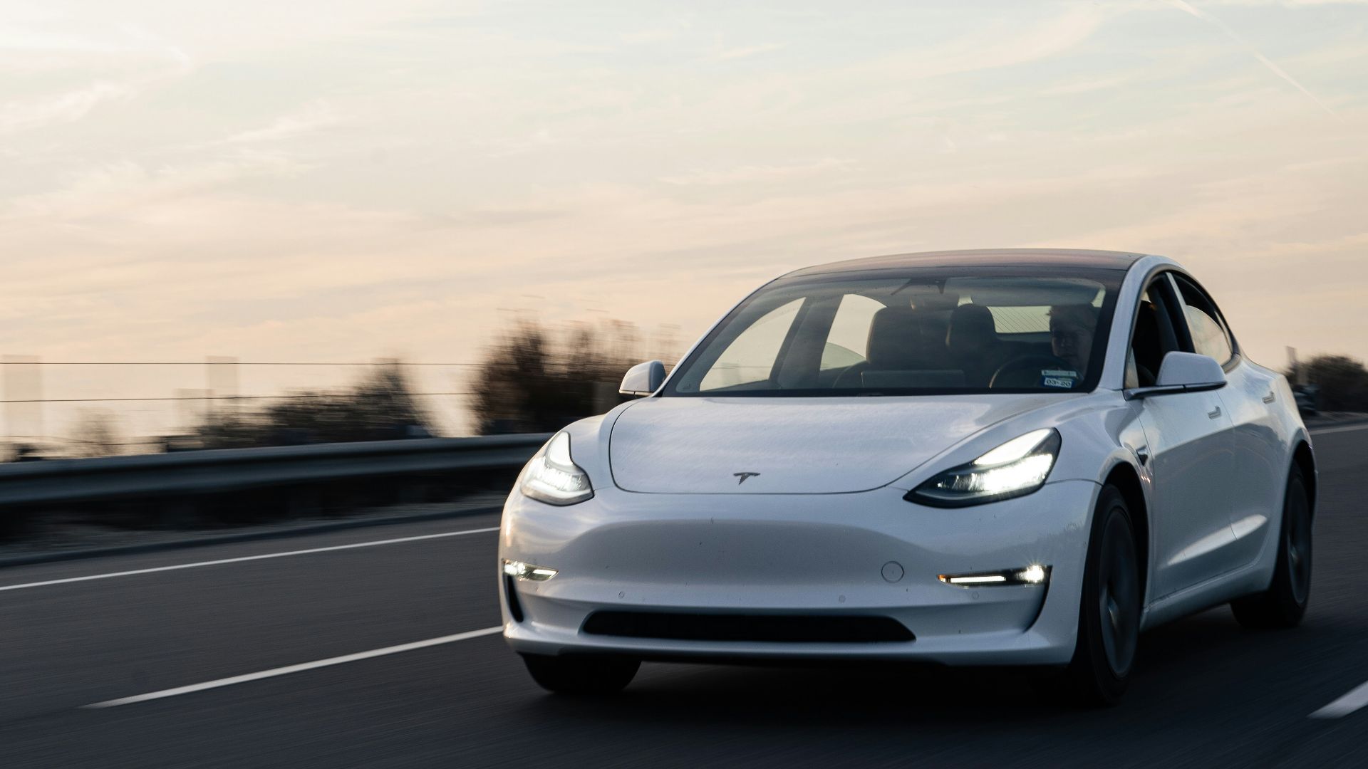white bmw m 3 on road