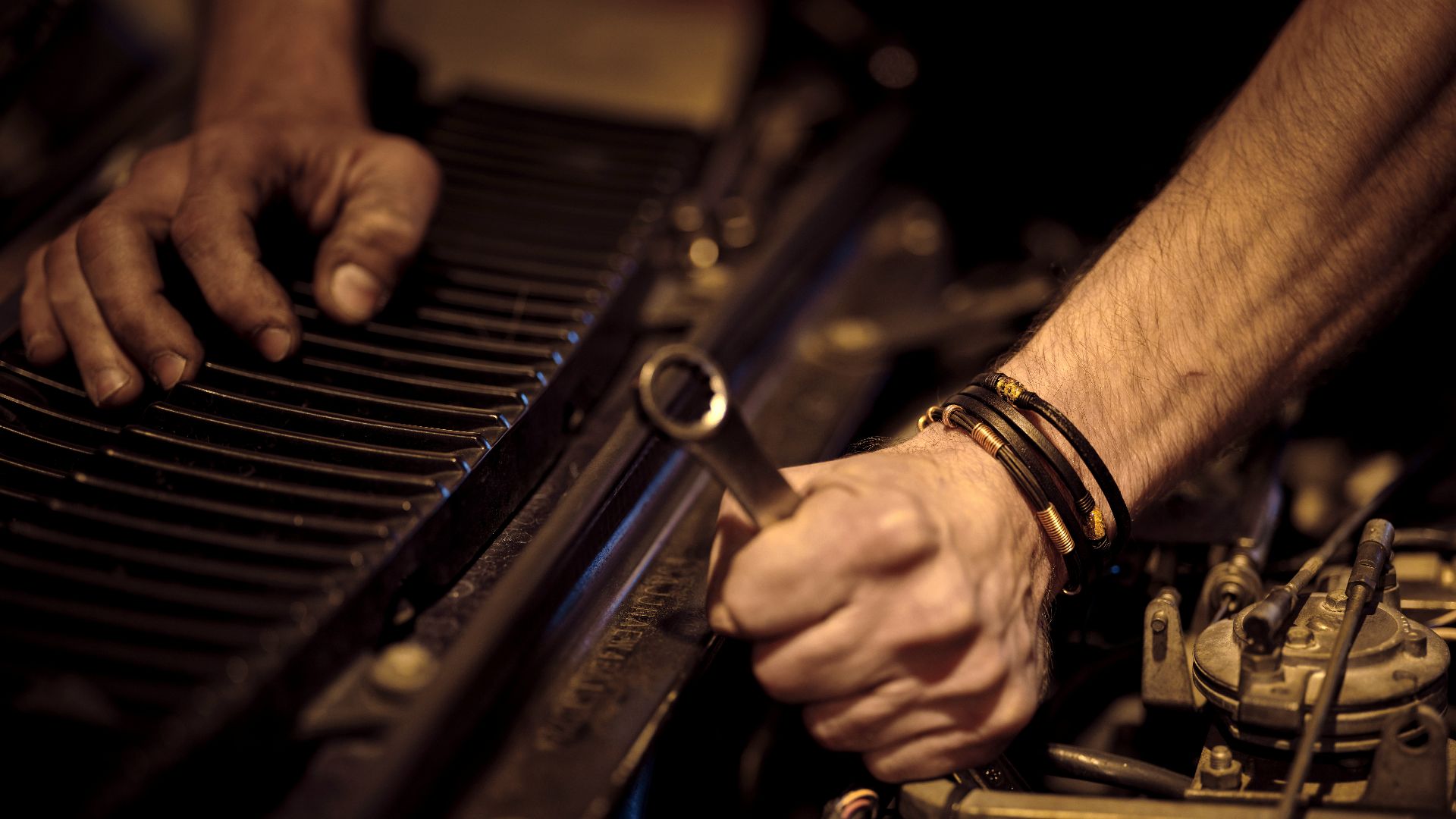 grayscale photo of person playing piano