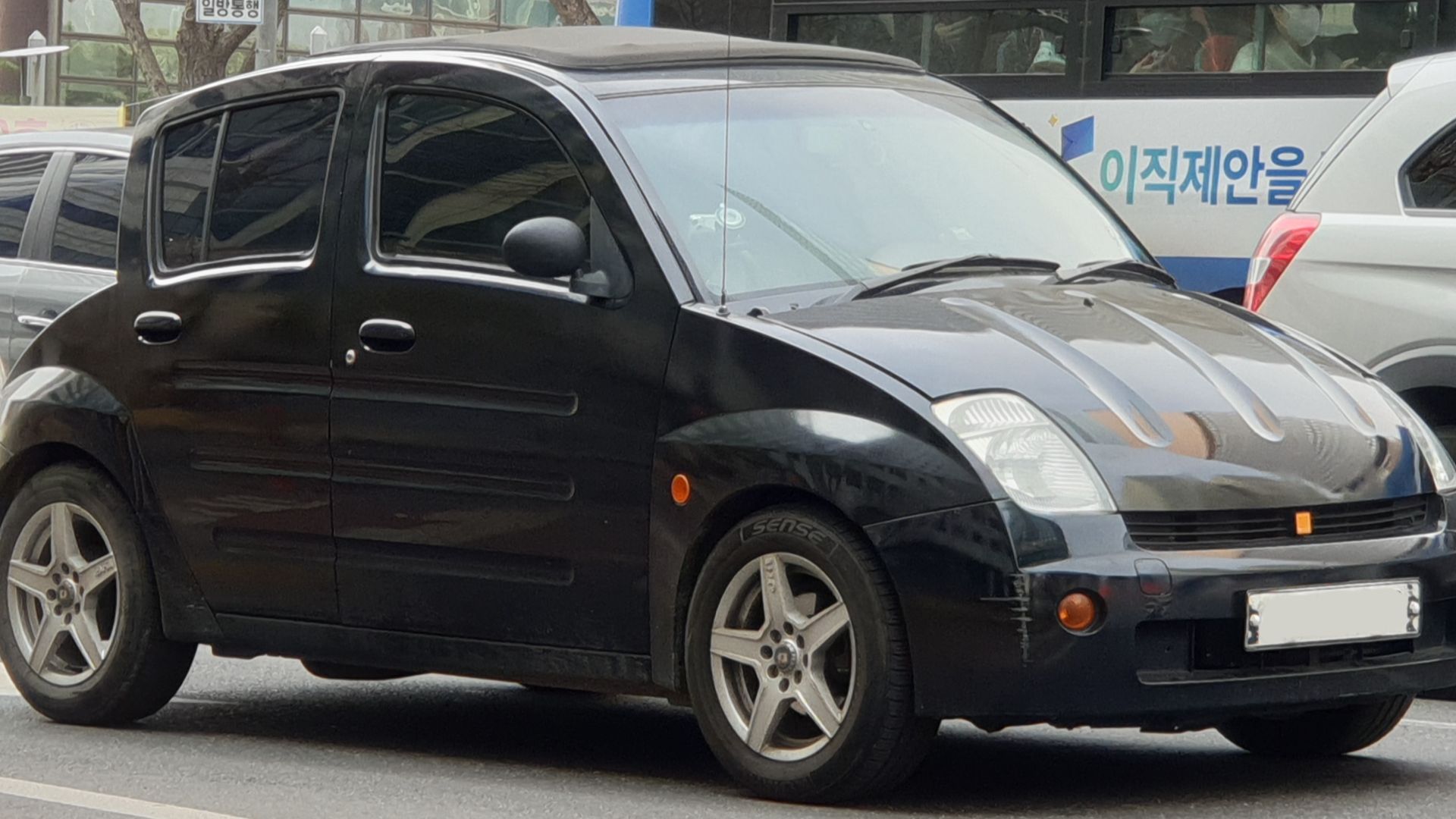 File:Toyota WiLL Vi Canvas Top NCP19 Black (2).jpg