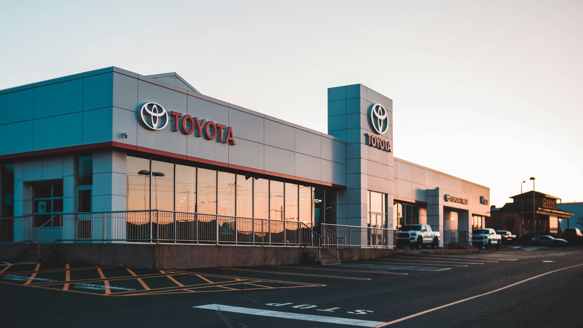 different vehicles outside Toyota building