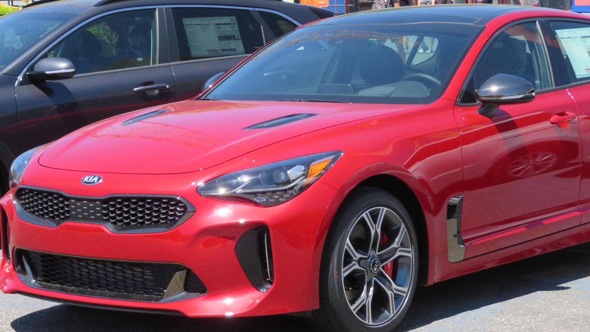 File:2018 Kia Stinger GT2 3.3L AWD in Hichroma red front 5.23.18.jpg