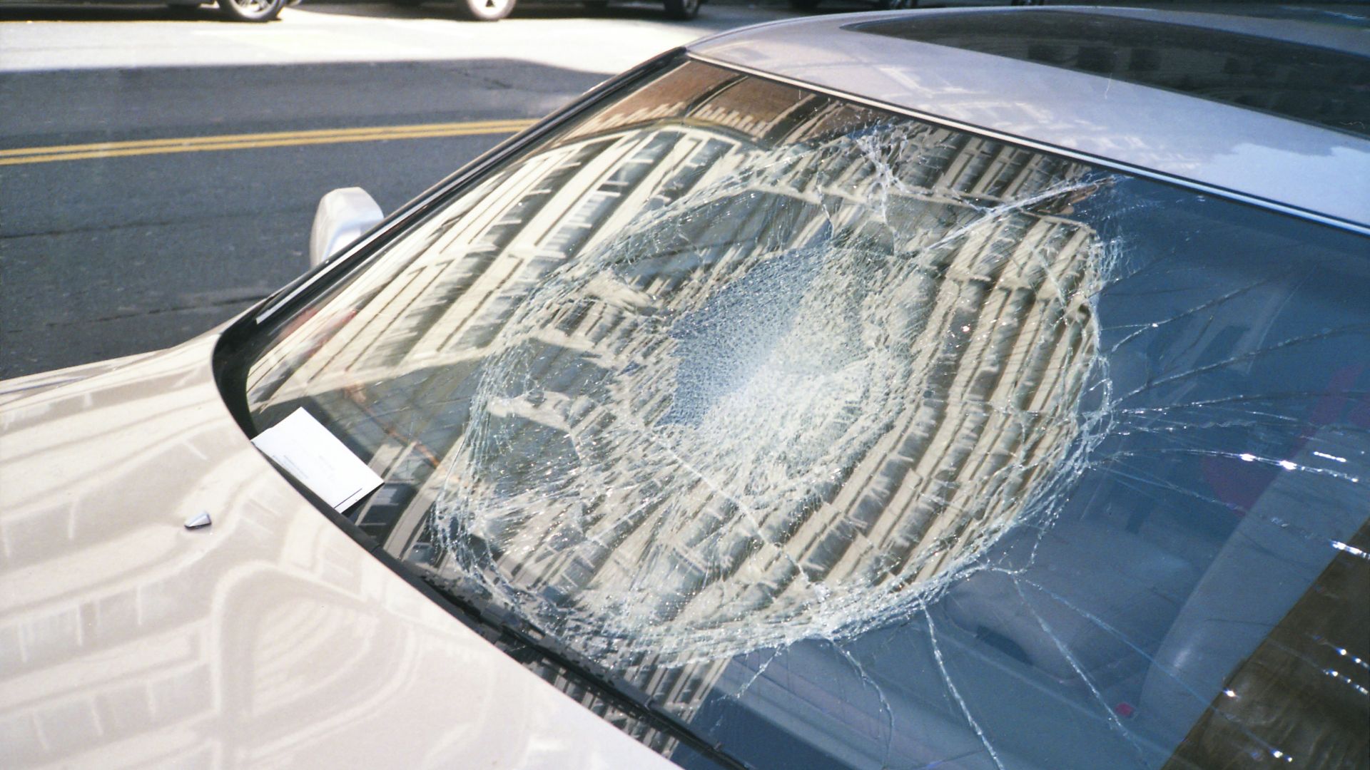 blue car with white snow on top