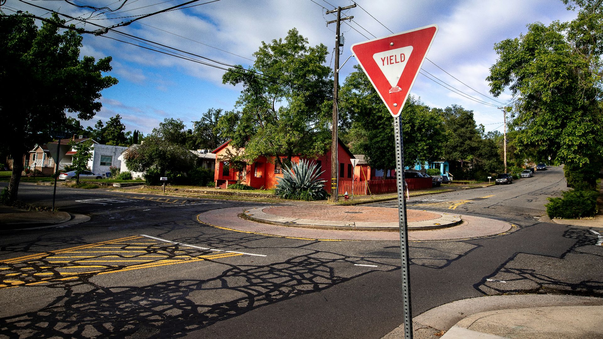 red street signage on focus photography