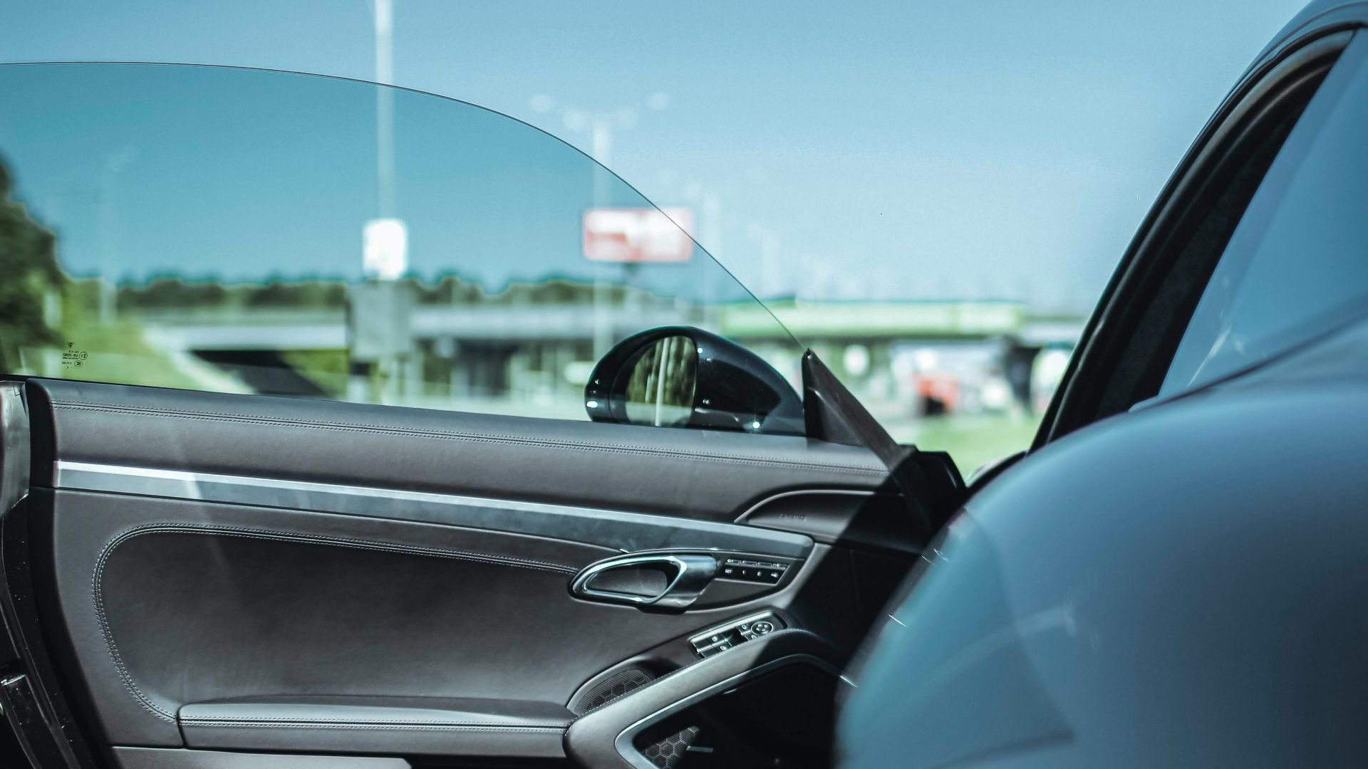 opened black vehicle's door