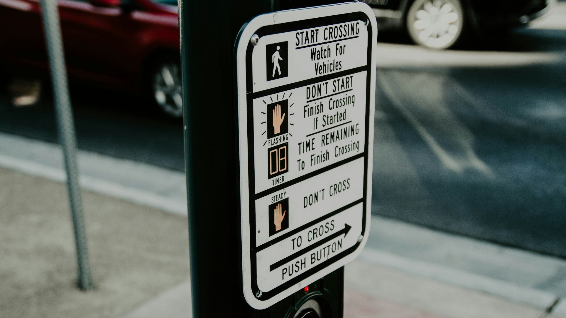 shallow focus photography of traffic light button