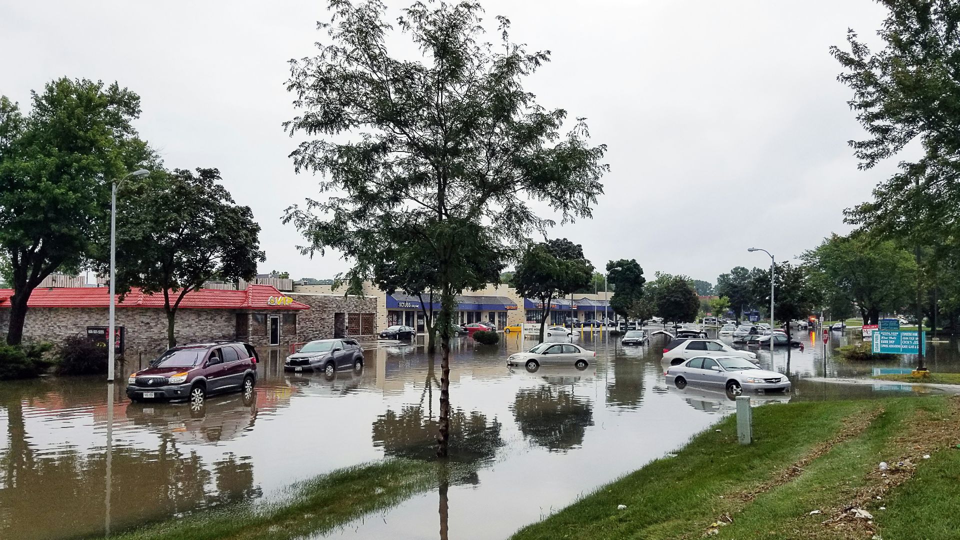 cars on flooded street