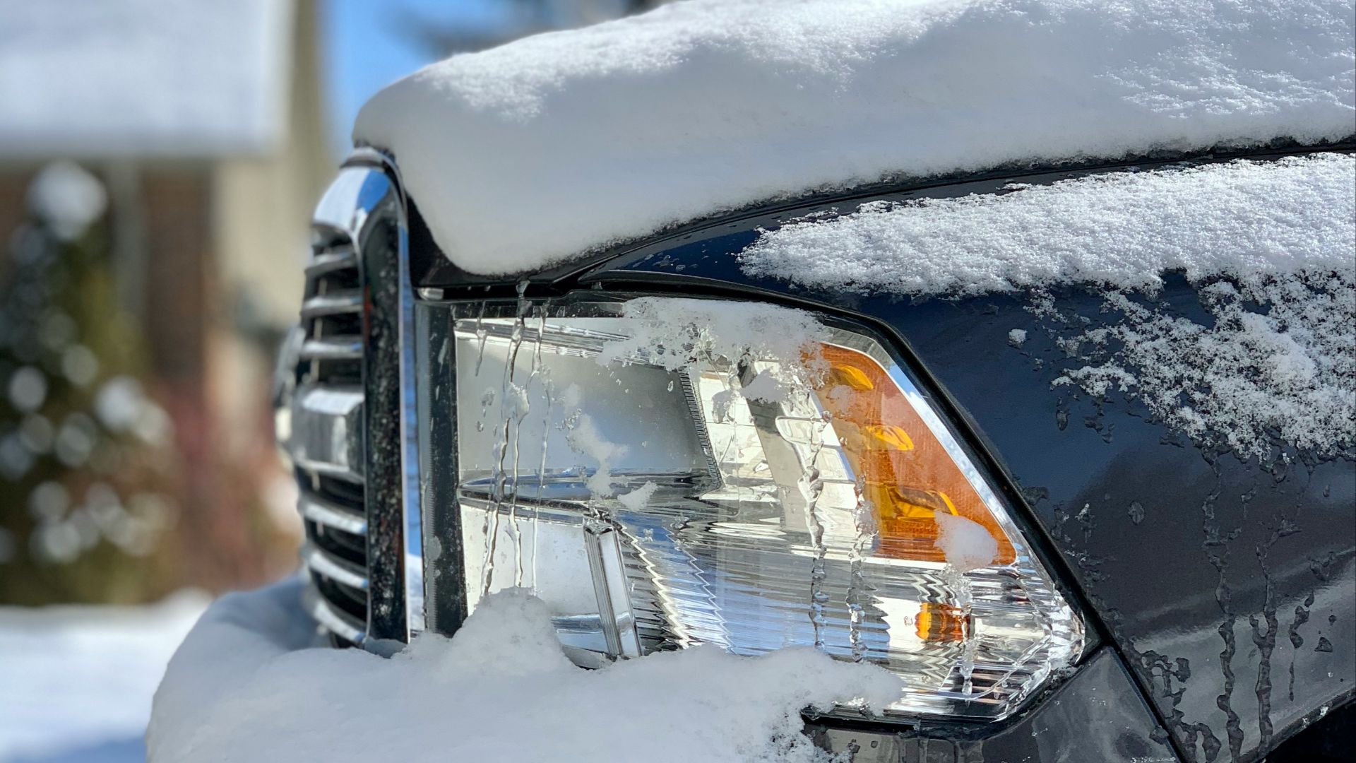 snow covered car during daytime