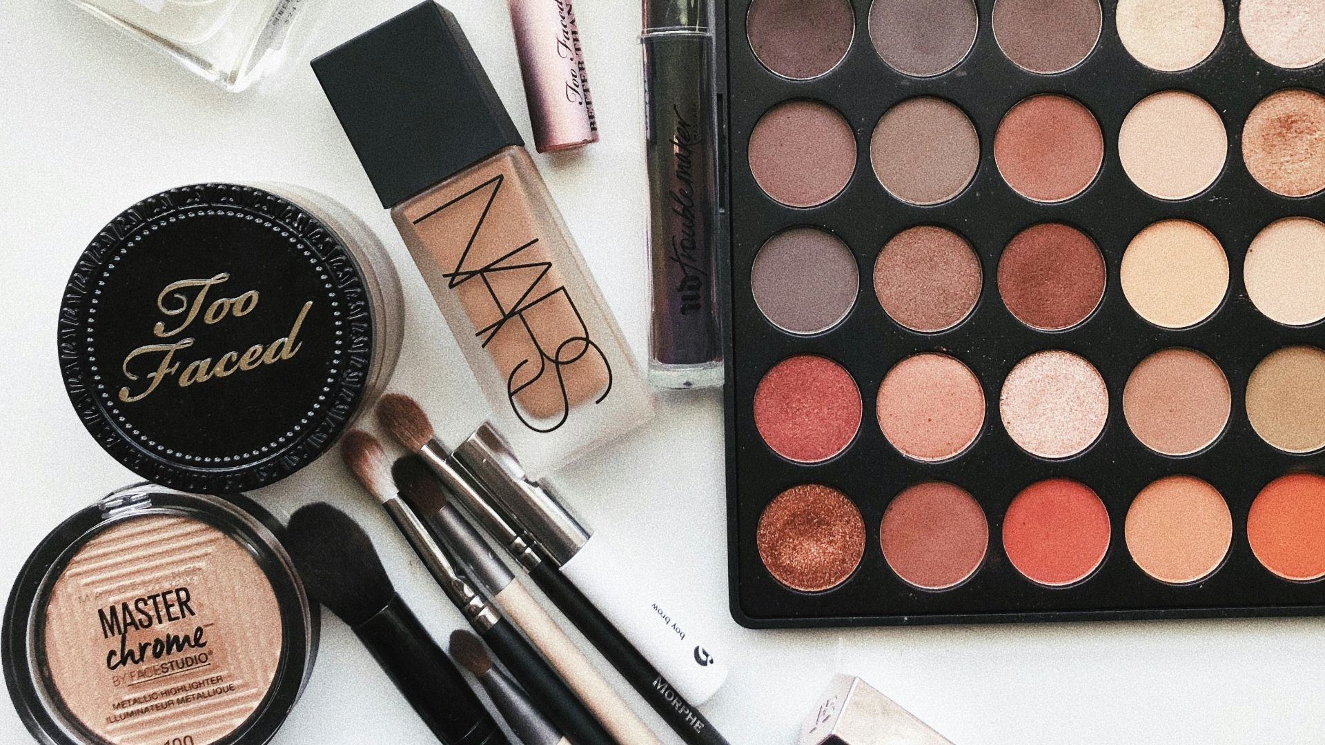 close-up photography of assorted cosmetics