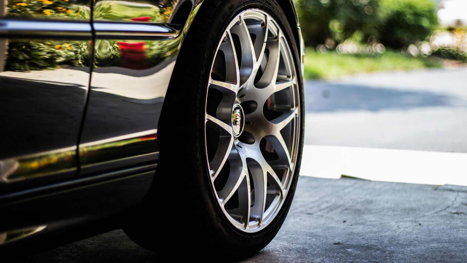 gray vehicle rim with tire