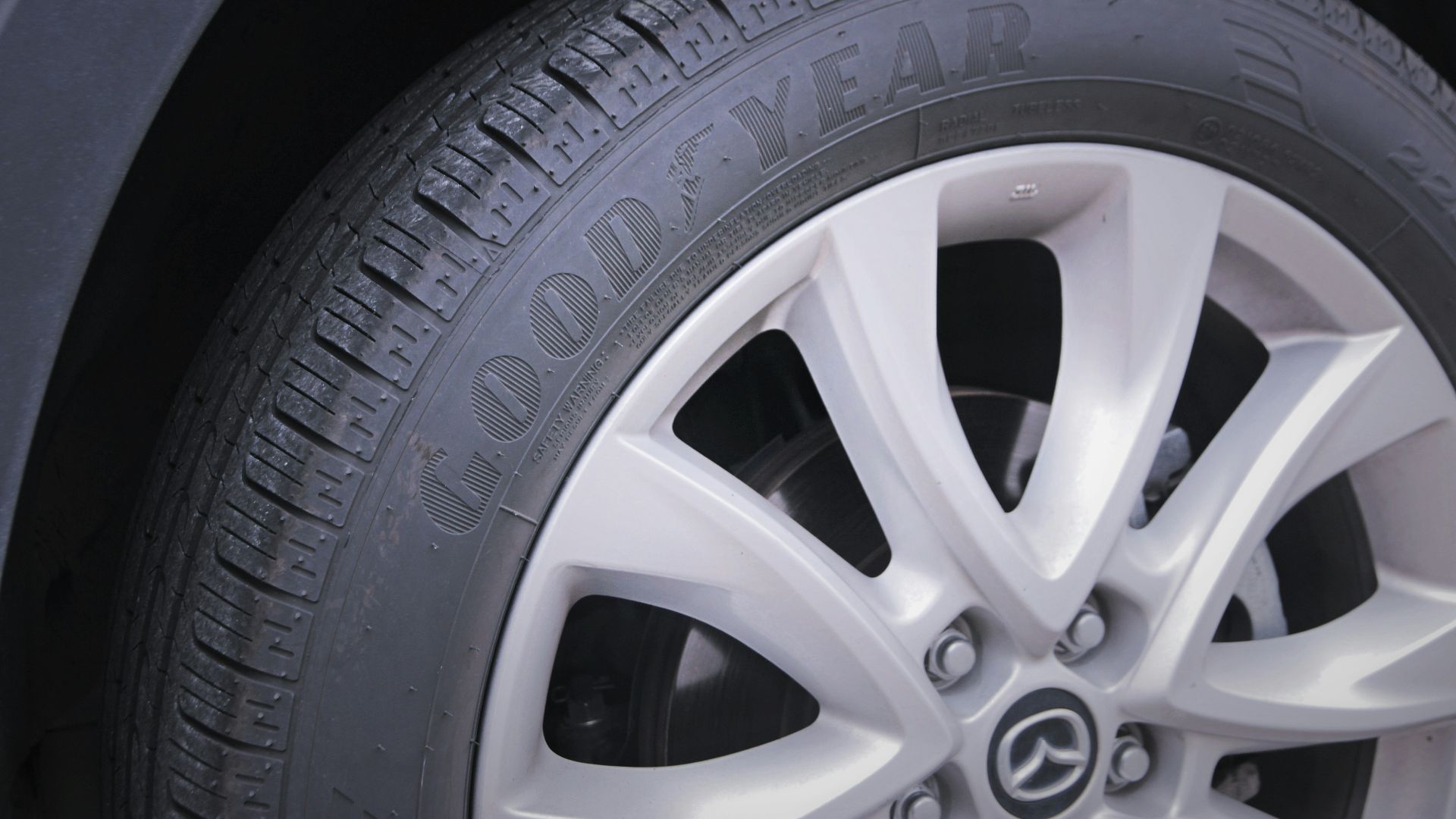 a close up of a tire on a car