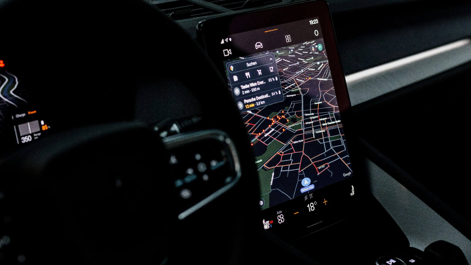 the dashboard of a car with a gps device