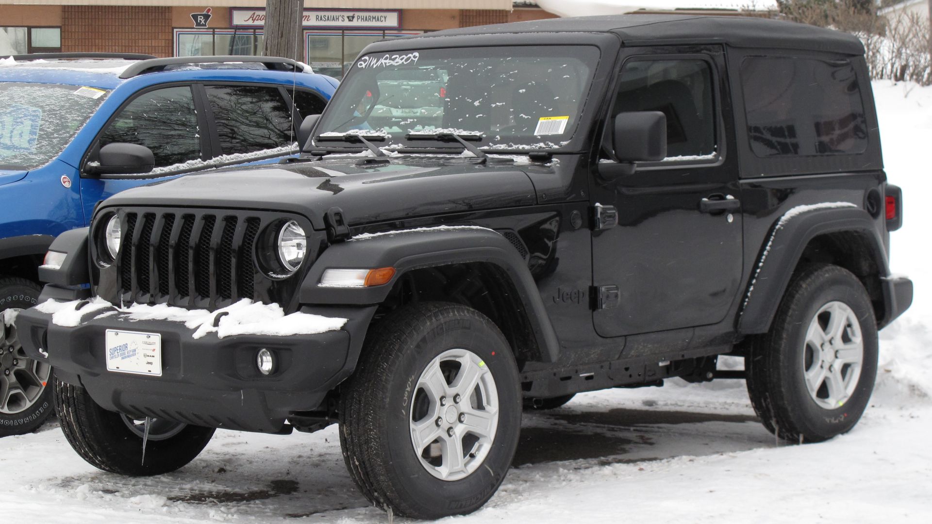File:2021 Jeep Wrangler Sport S 4x4 in Black, Front Left, 01-16-2022.jpg