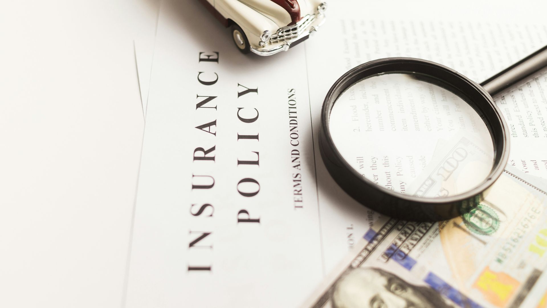 a magnifying glass sitting on top of a piece of paper