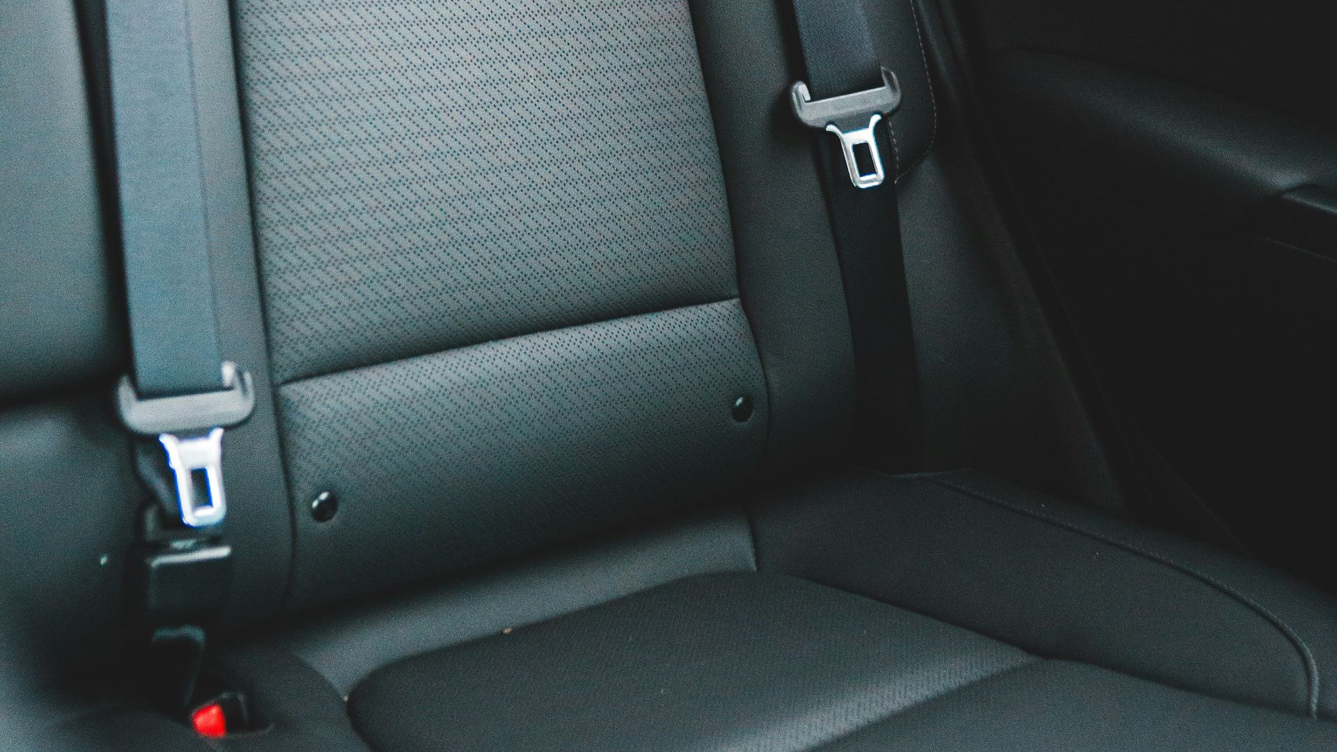 black leather car seat during daytime