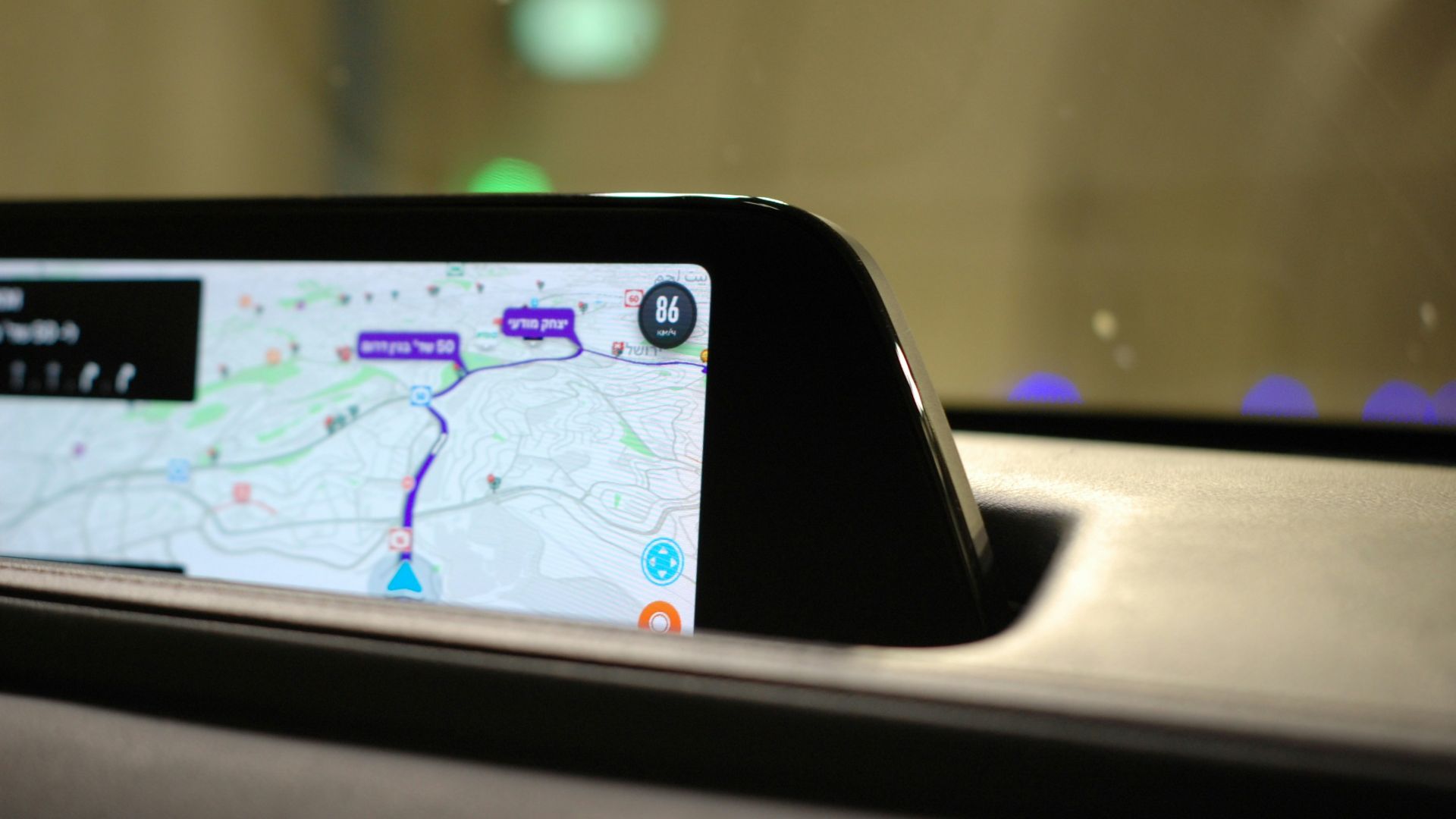 a car dashboard with a gps app on it