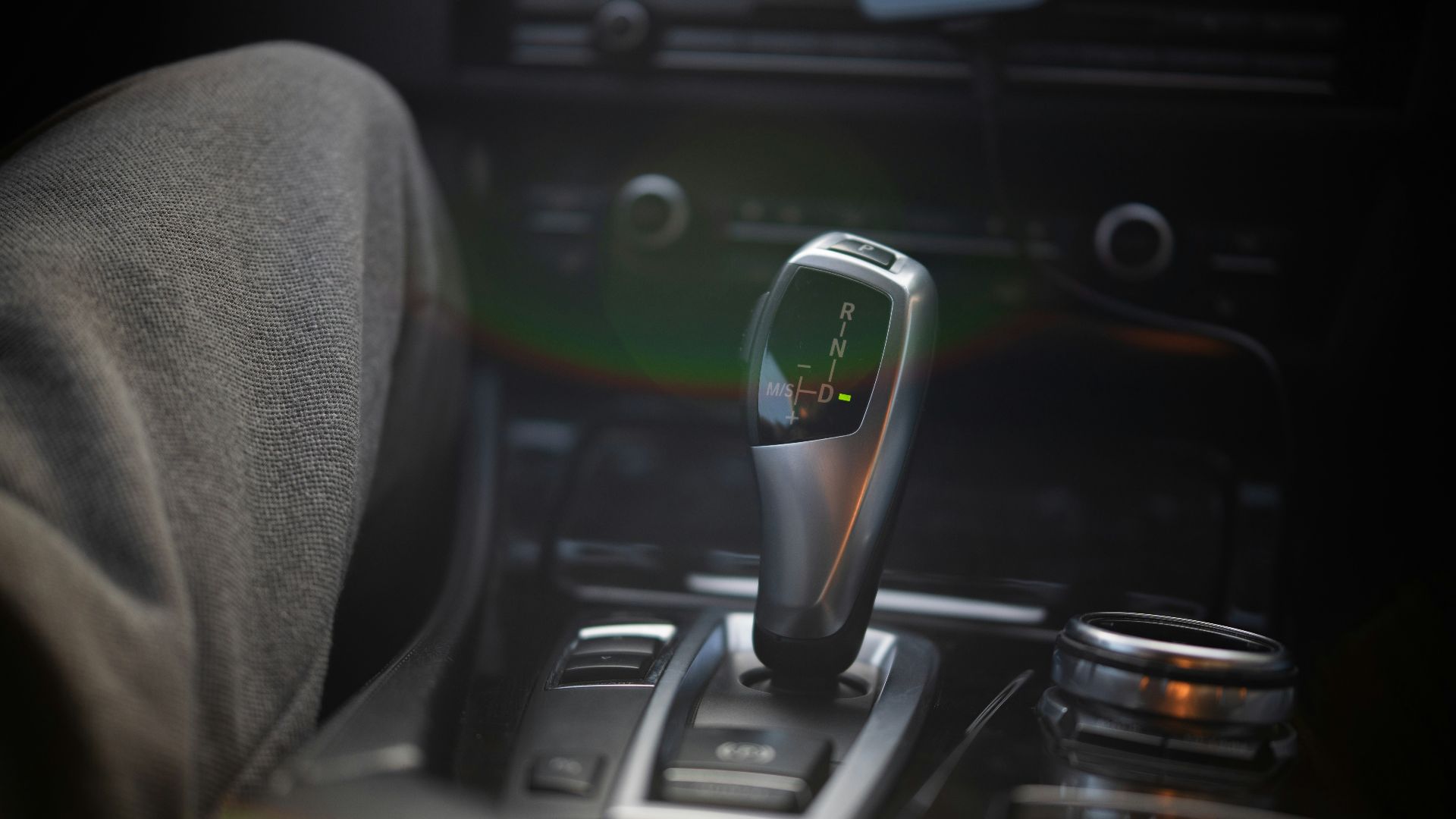 A close up of a person's feet in a car