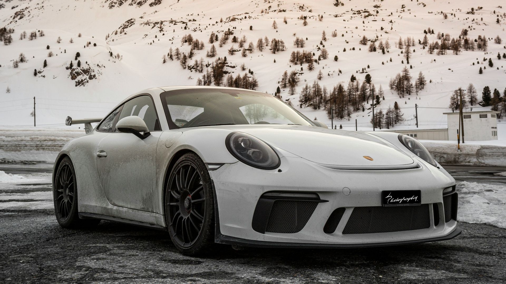 silver porsche 911 on road during daytime