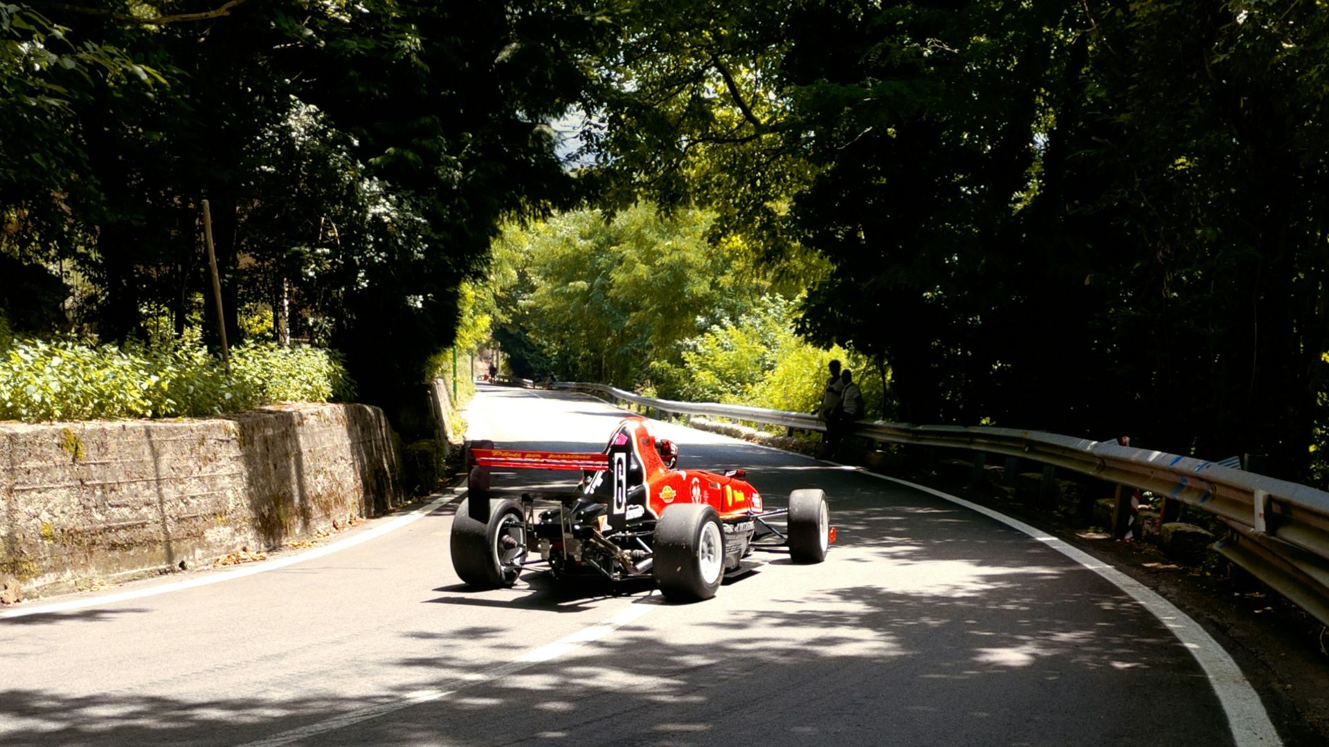 red and black auto rickshaw on road during daytime