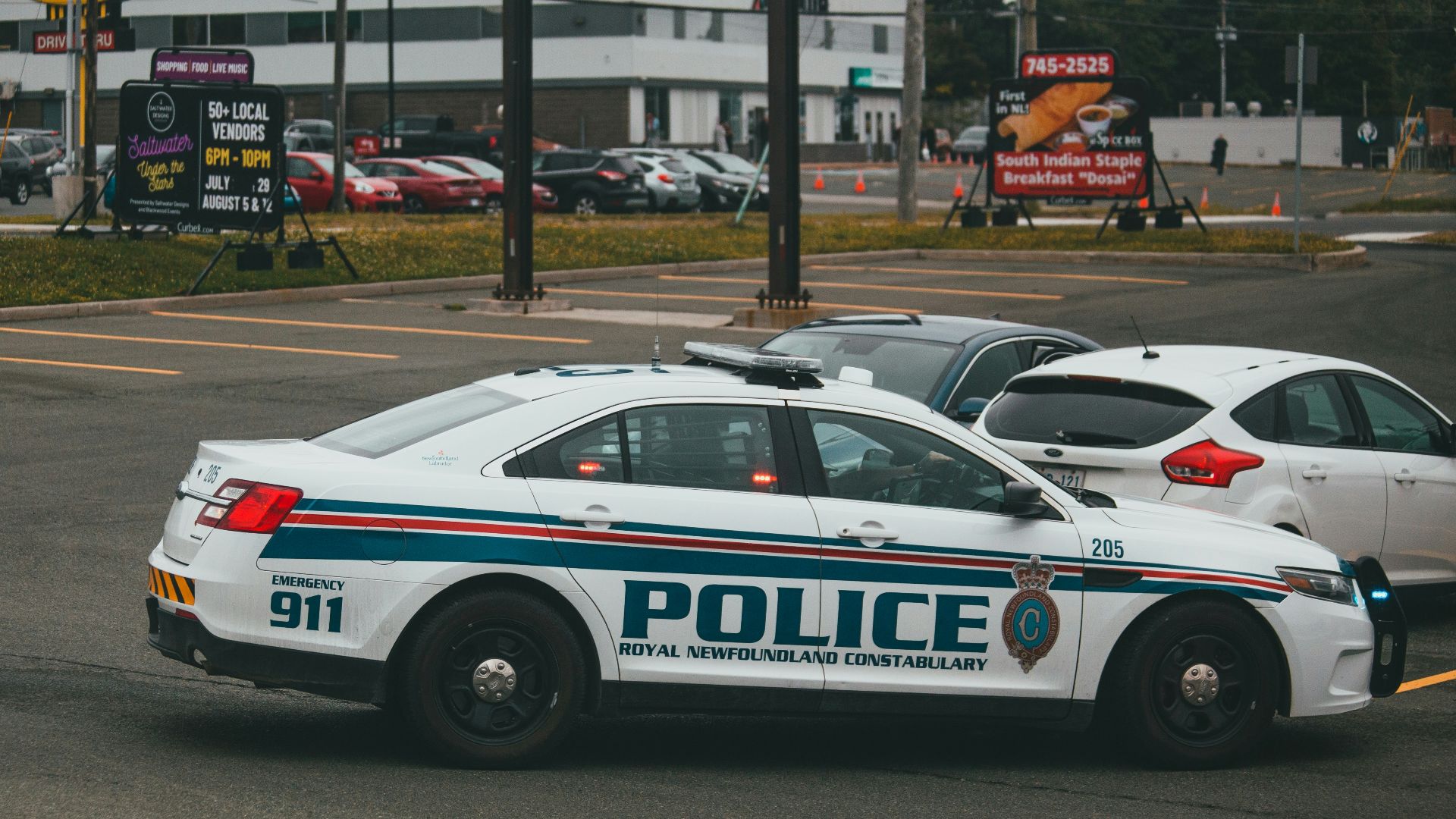 white and blue bmw m 3 on road during daytime