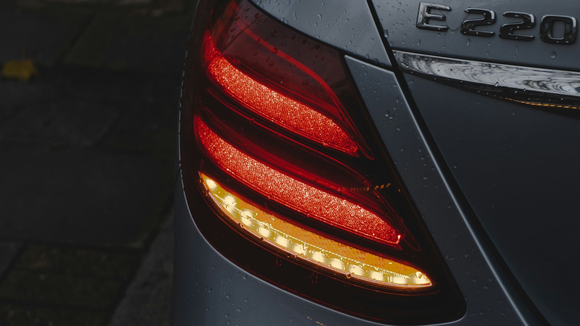 black car on gray concrete road