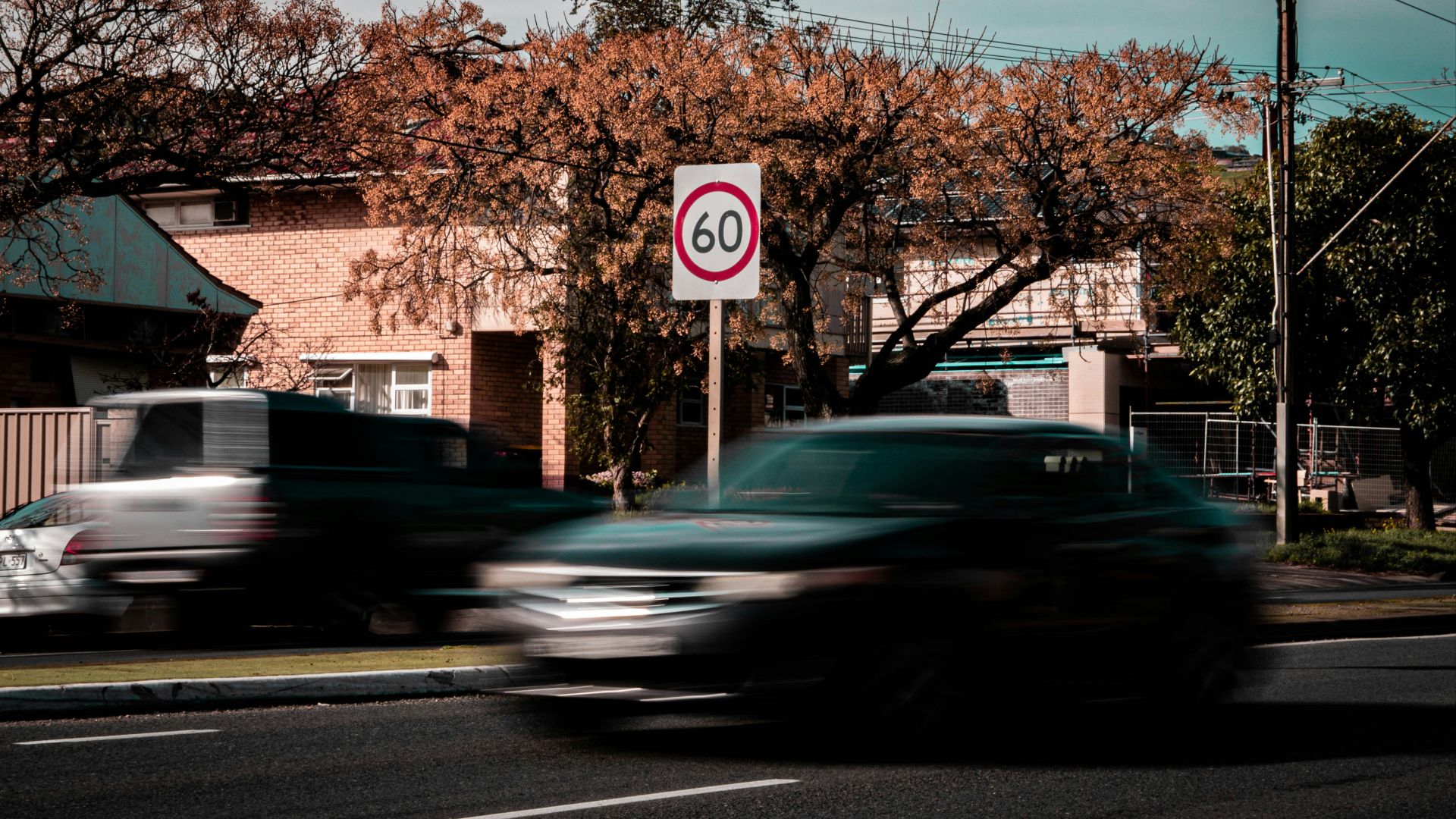 time lapse photo of car on road